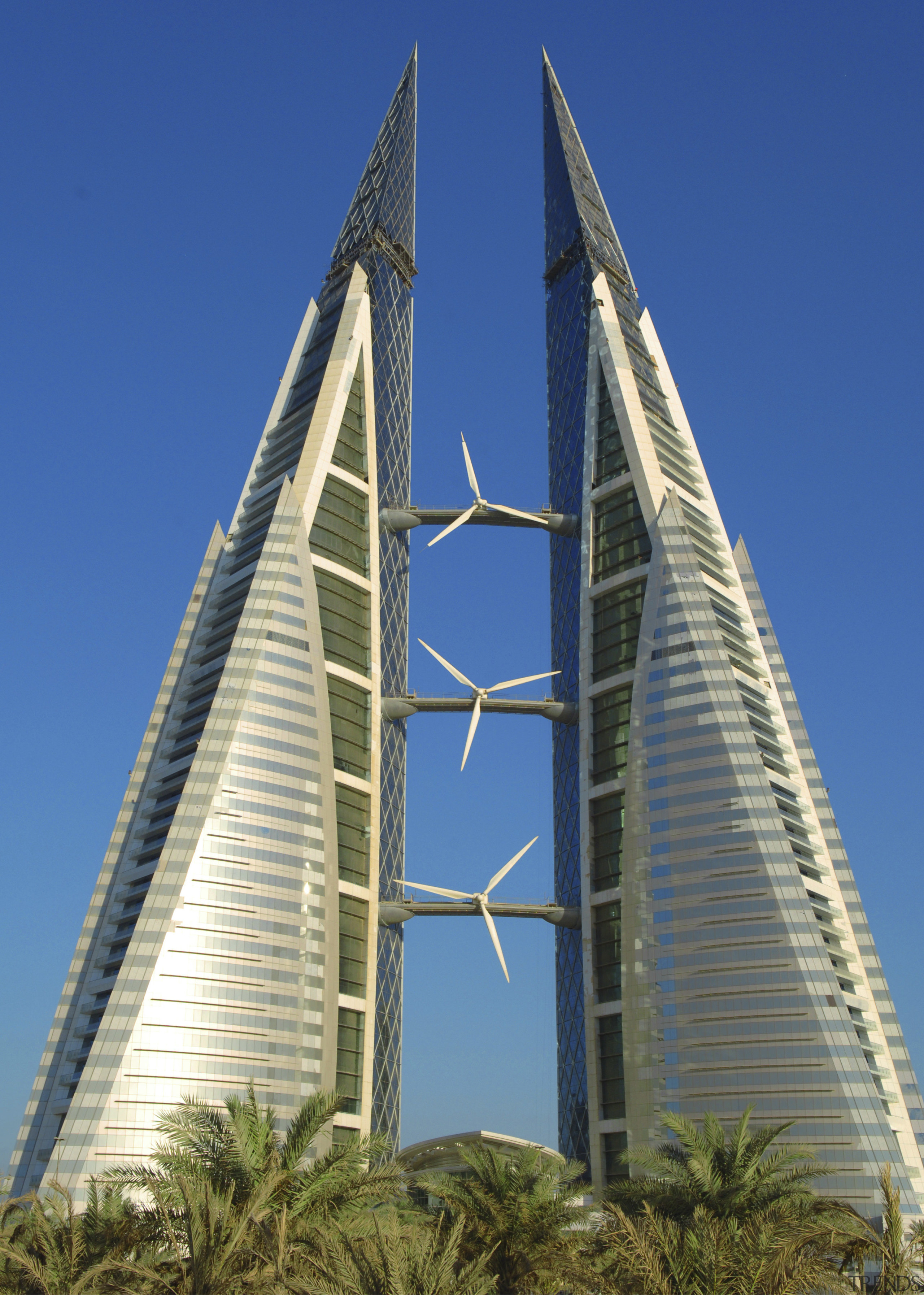 The new Bahrain world Trade Centre meets up architecture, building, corporate headquarters, daytime, landmark, metropolitan area, sky, skyscraper, tower, tower block, blue