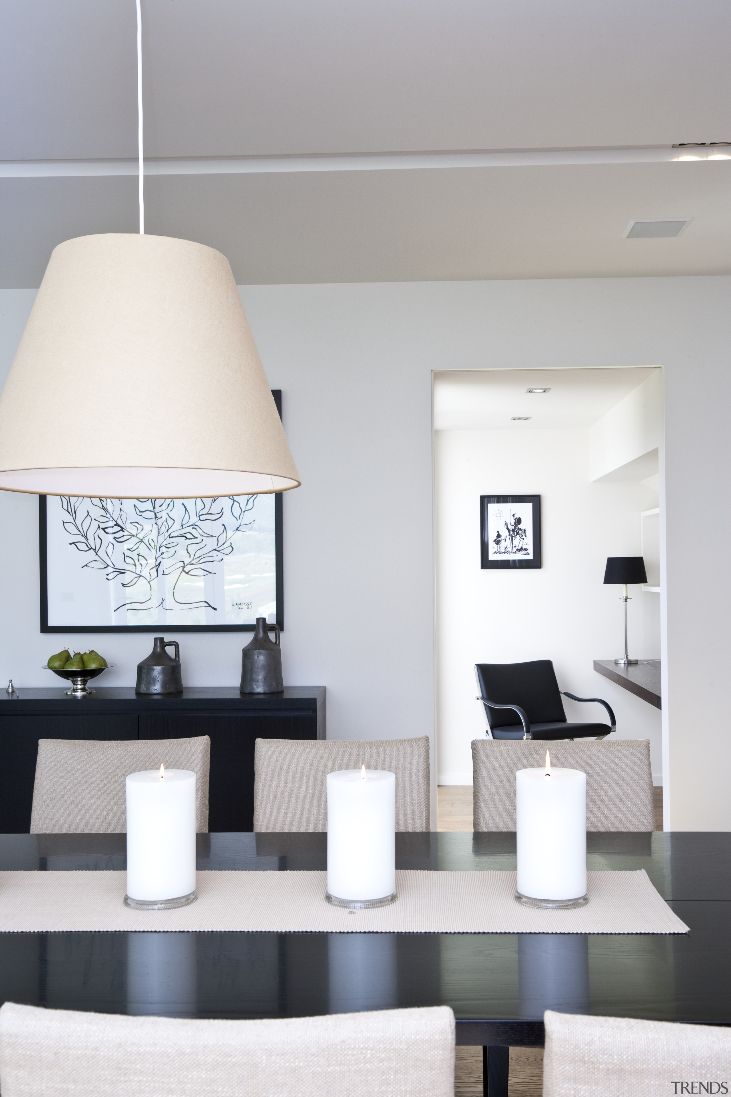 View of dining area which features a black ceiling, furniture, home, interior design, light fixture, lighting accessory, living room, product design, table, gray, white