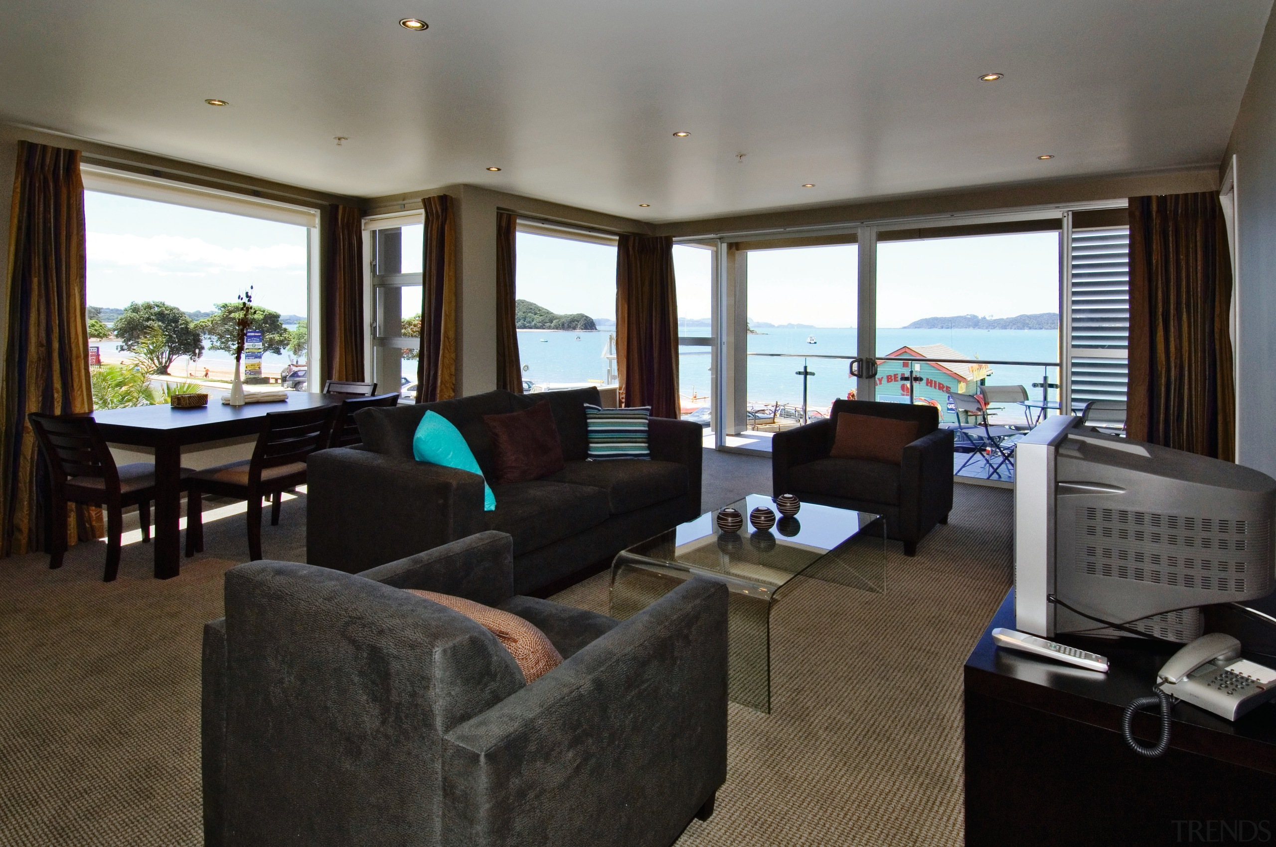 view of the living area featuring lounge suite, interior design, living room, real estate, room, black, gray