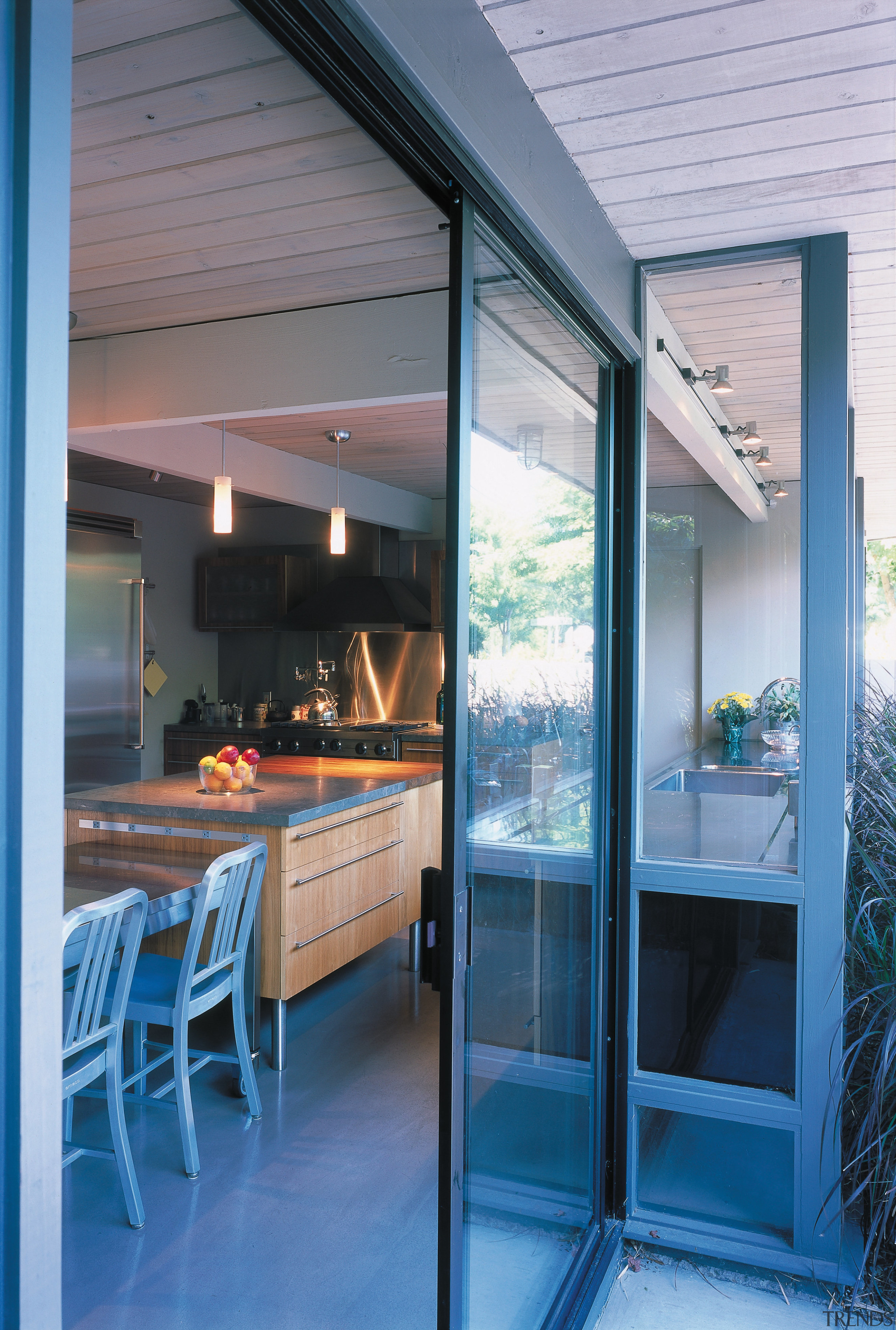 A view of a kitchen designed by Baum door, glass, house, interior design, window, gray