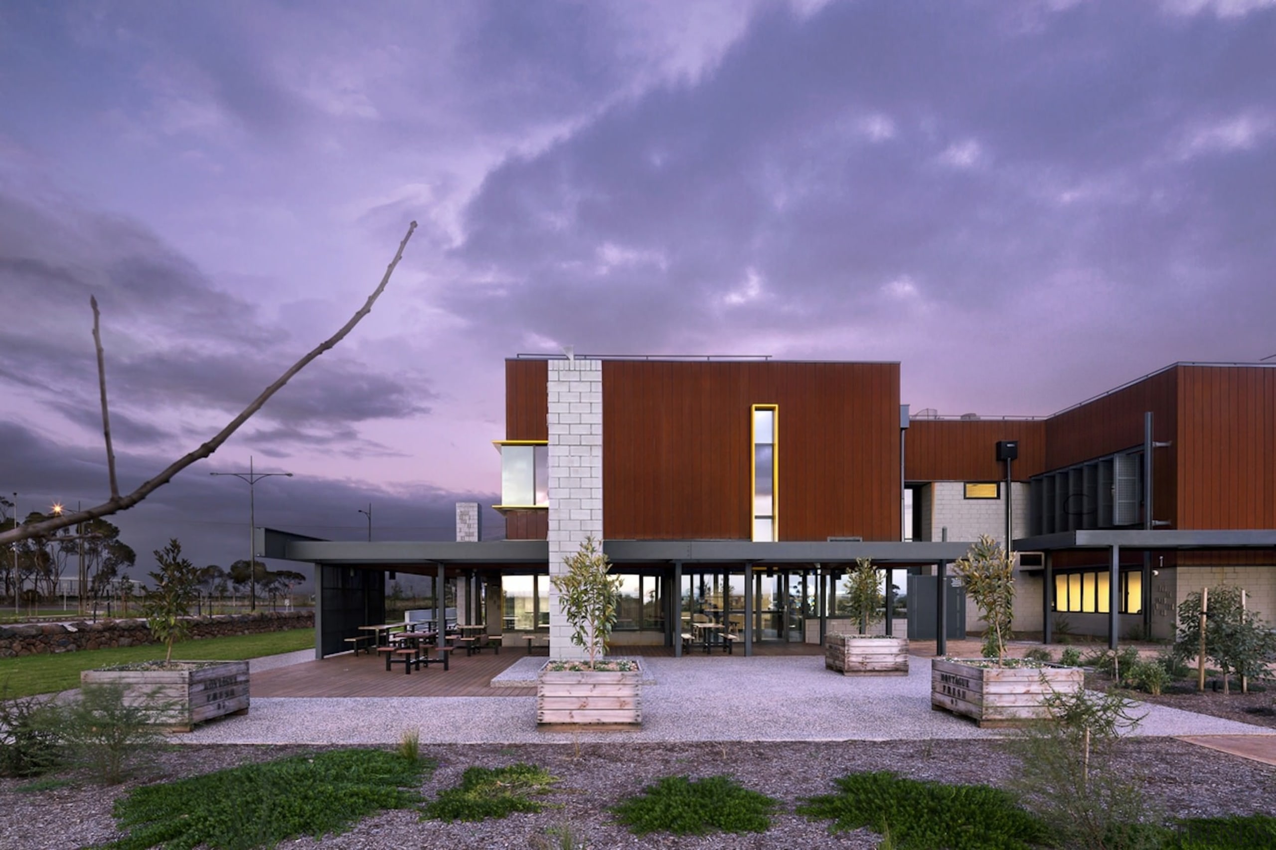 Another view of the main courtyard outside the architecture, building, corporate headquarters, facade, home, house, real estate, residential area, sky, purple