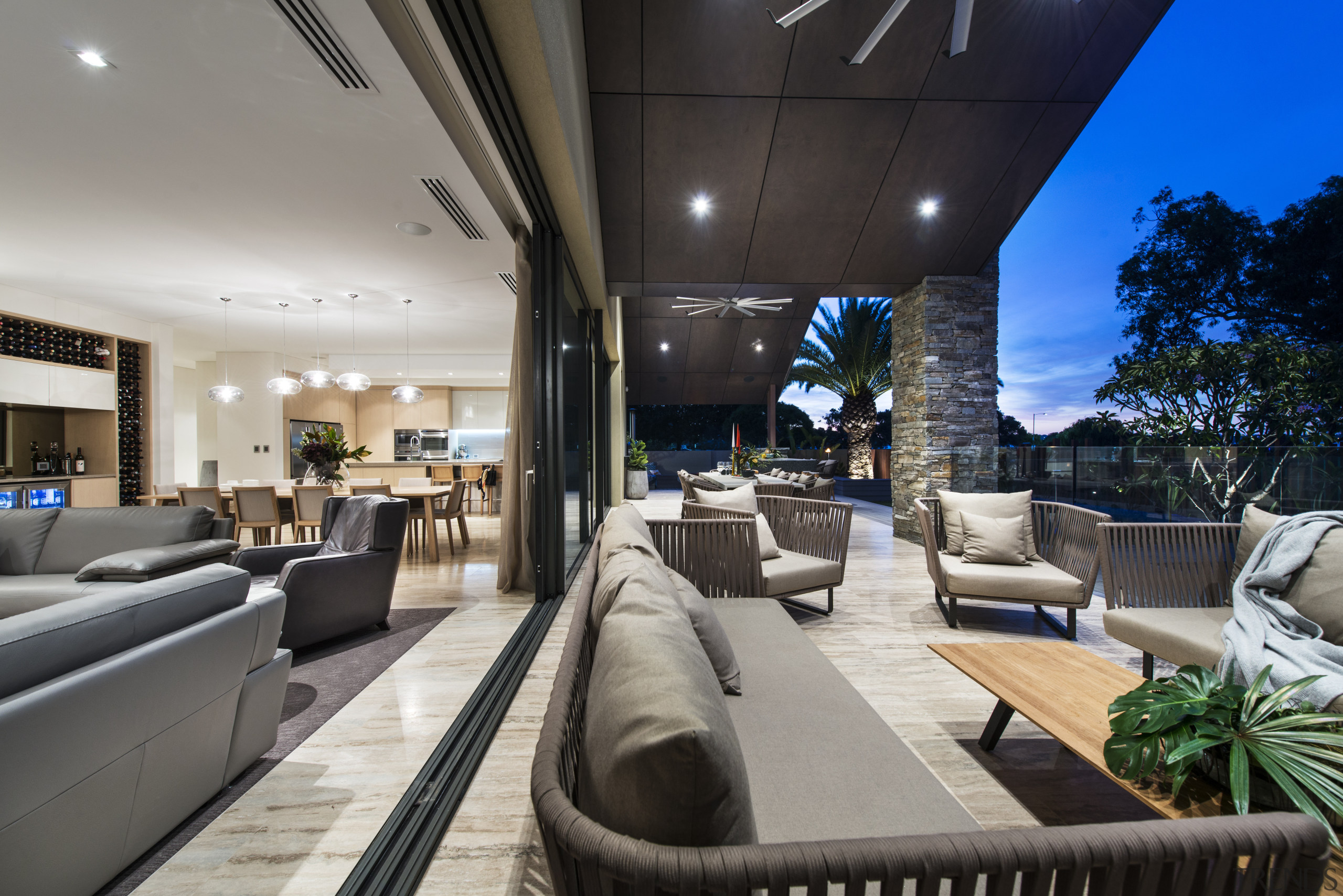 Floor-to-ceiling stacker doors slide back to either side, interior design, real estate, gray, black