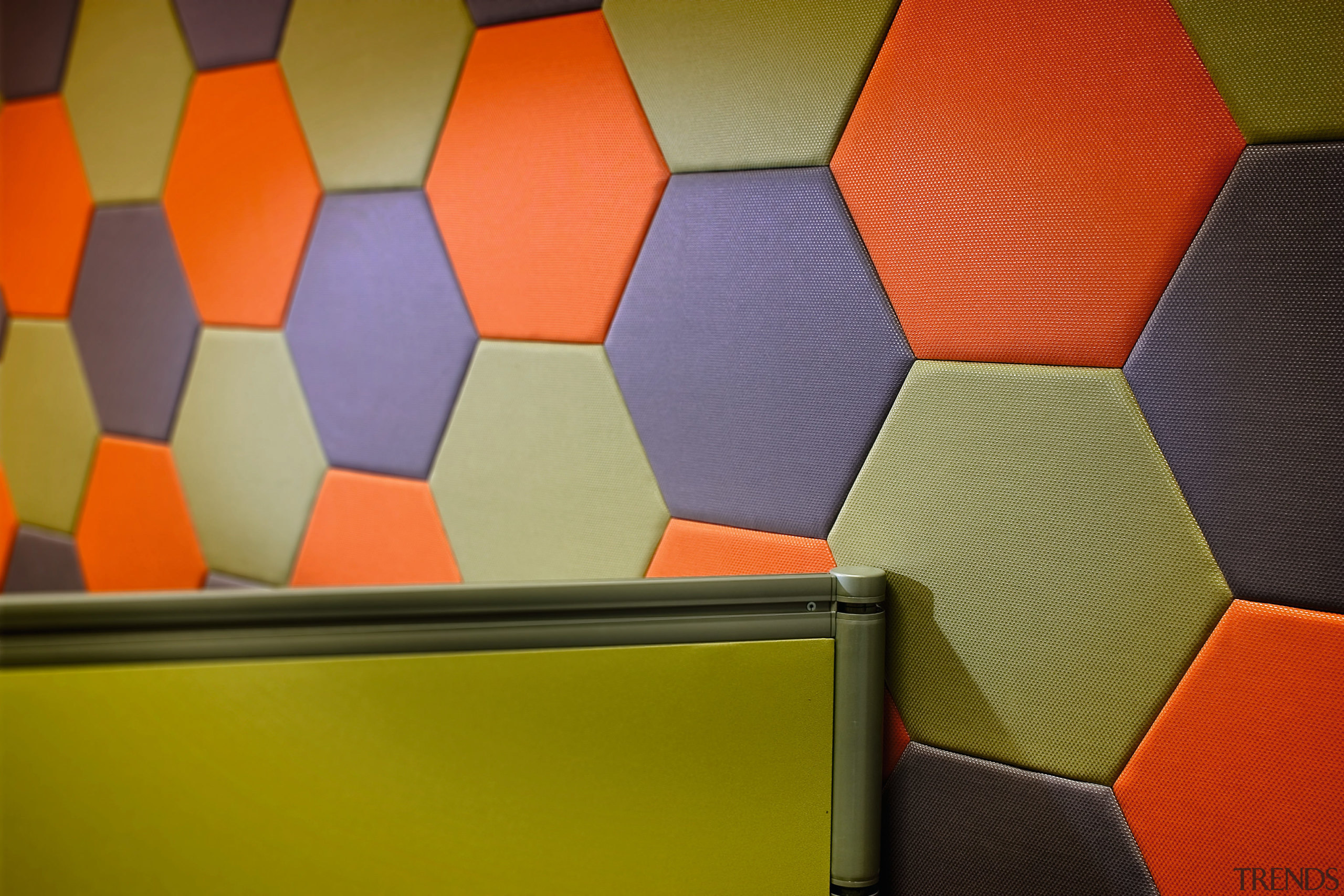 Close up of a wall made of many angle, floor, line, orange, red, wall, wood, yellow, brown