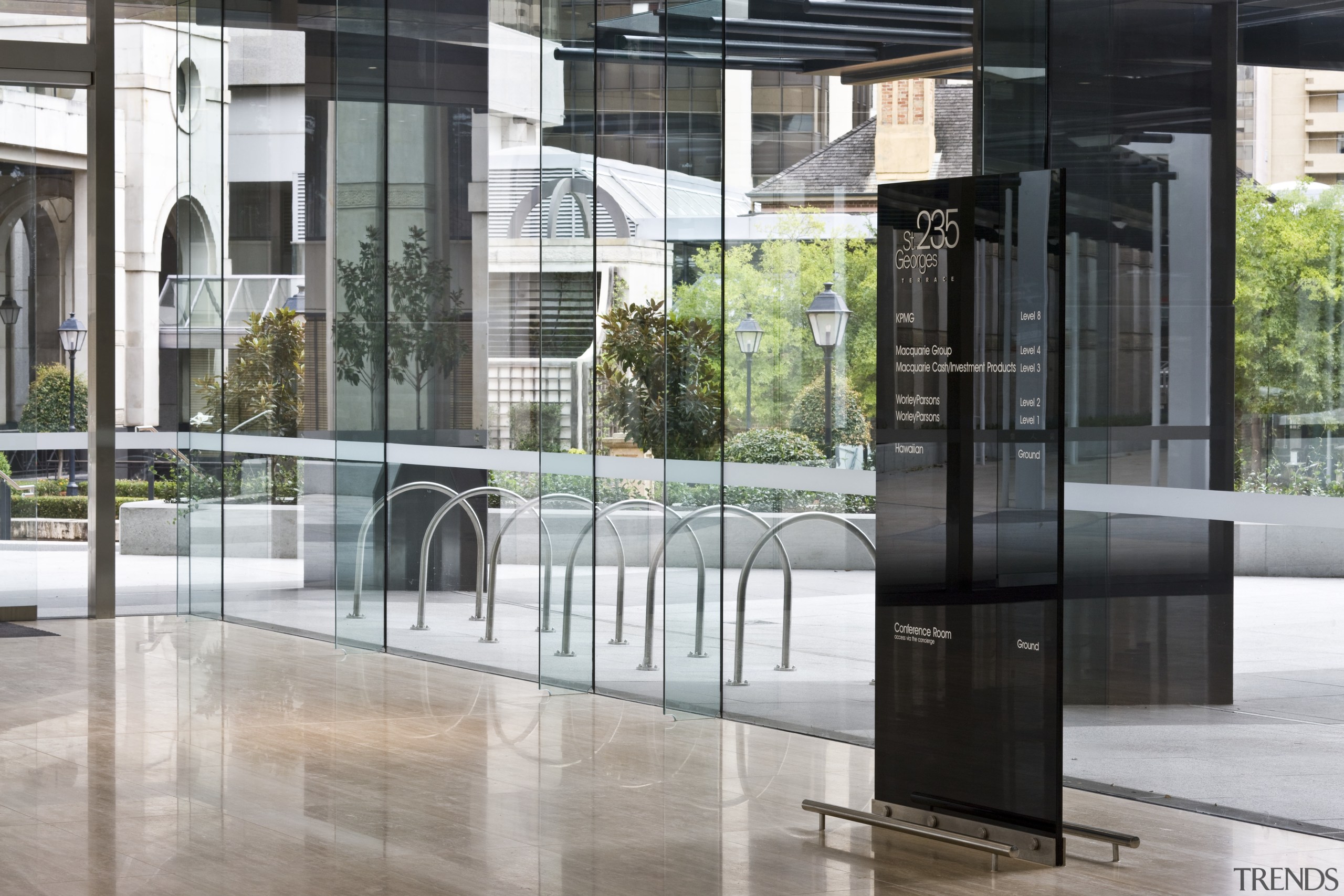 Interior view of the eco-friendly offices which were door, glass, gray, black