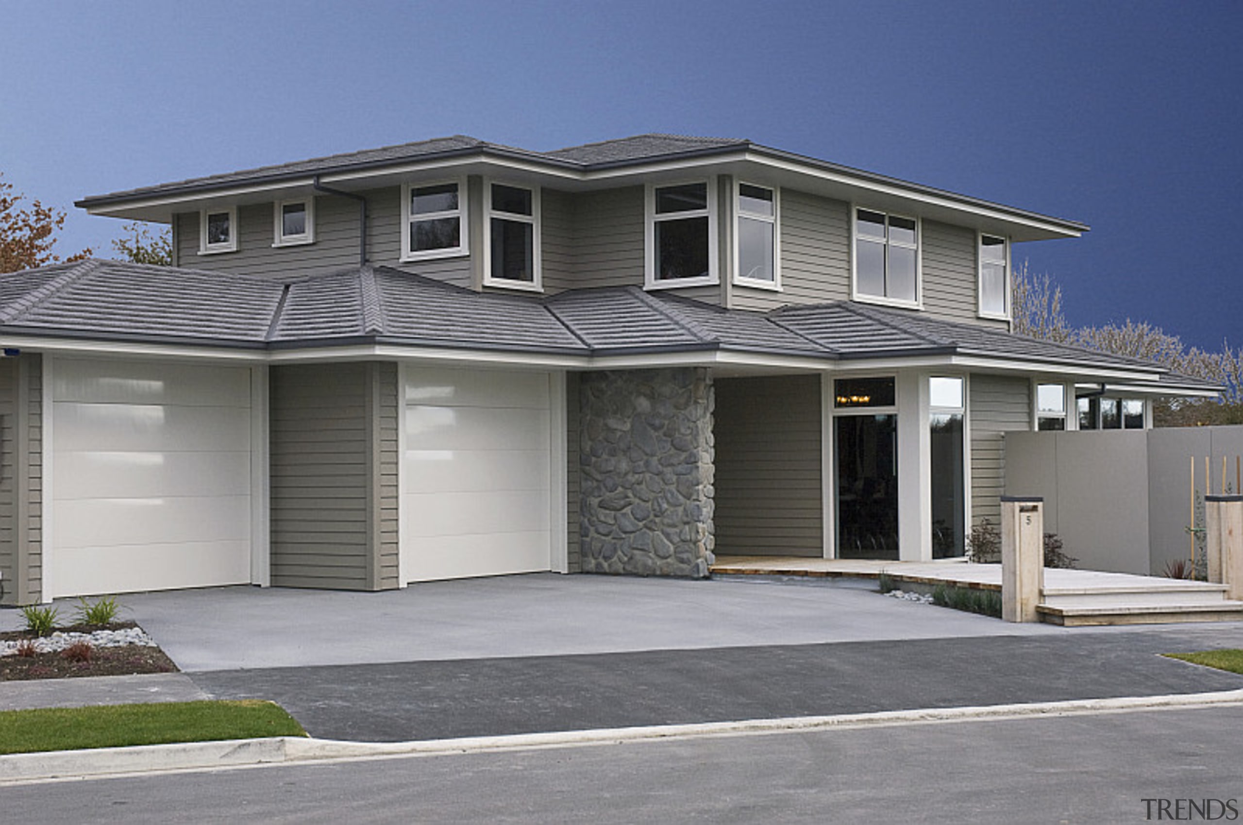 Generously proportioned two-storey home crafted from Linea weatherboard building, elevation, estate, facade, home, house, neighbourhood, property, real estate, residential area, roof, siding, suburb, window, gray