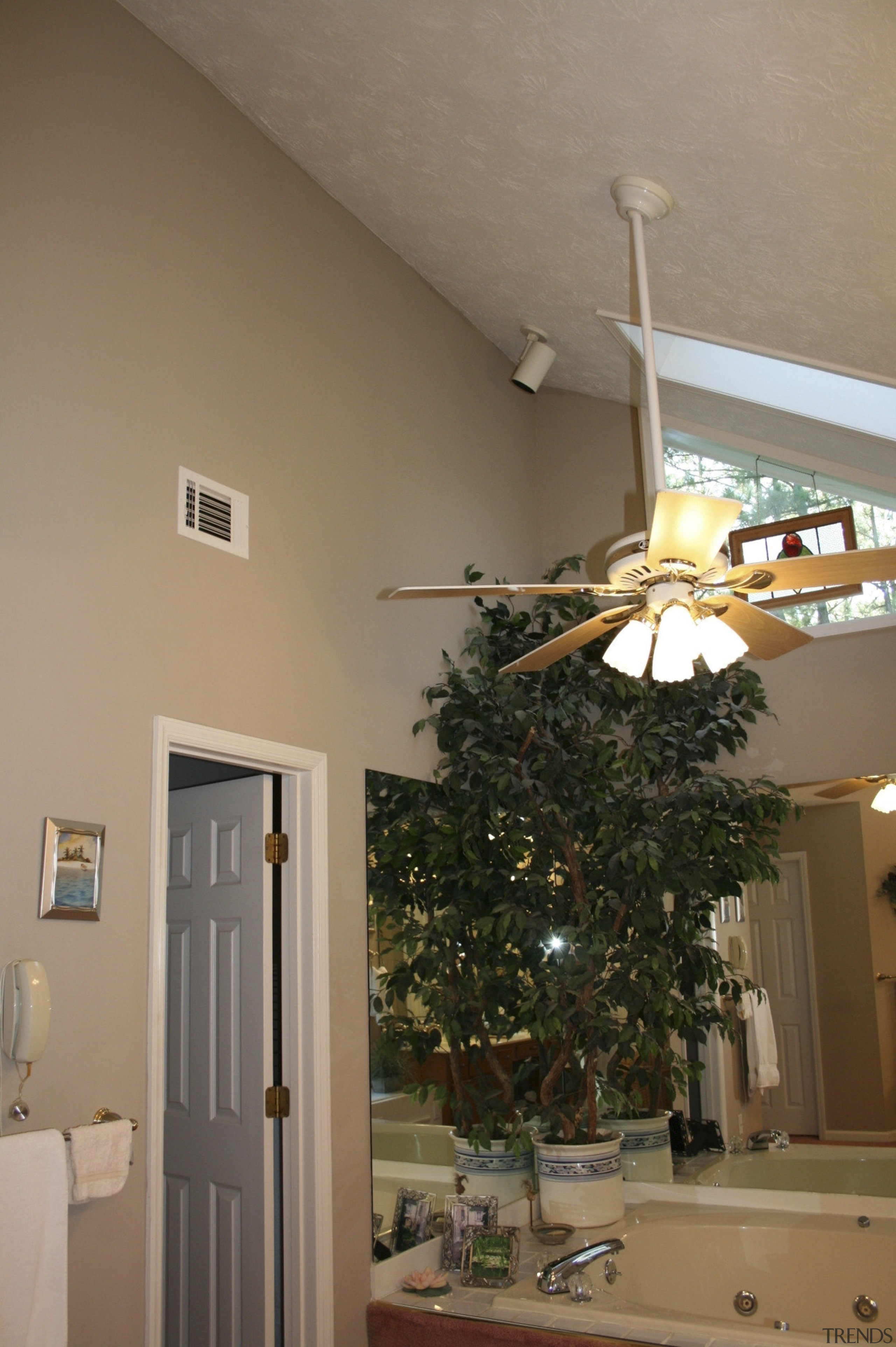 View of modernized bathroom with mosaic design tub architecture, ceiling, daylighting, home, house, interior design, light fixture, lighting, living room, mechanical fan, room, wall, window, wood, brown