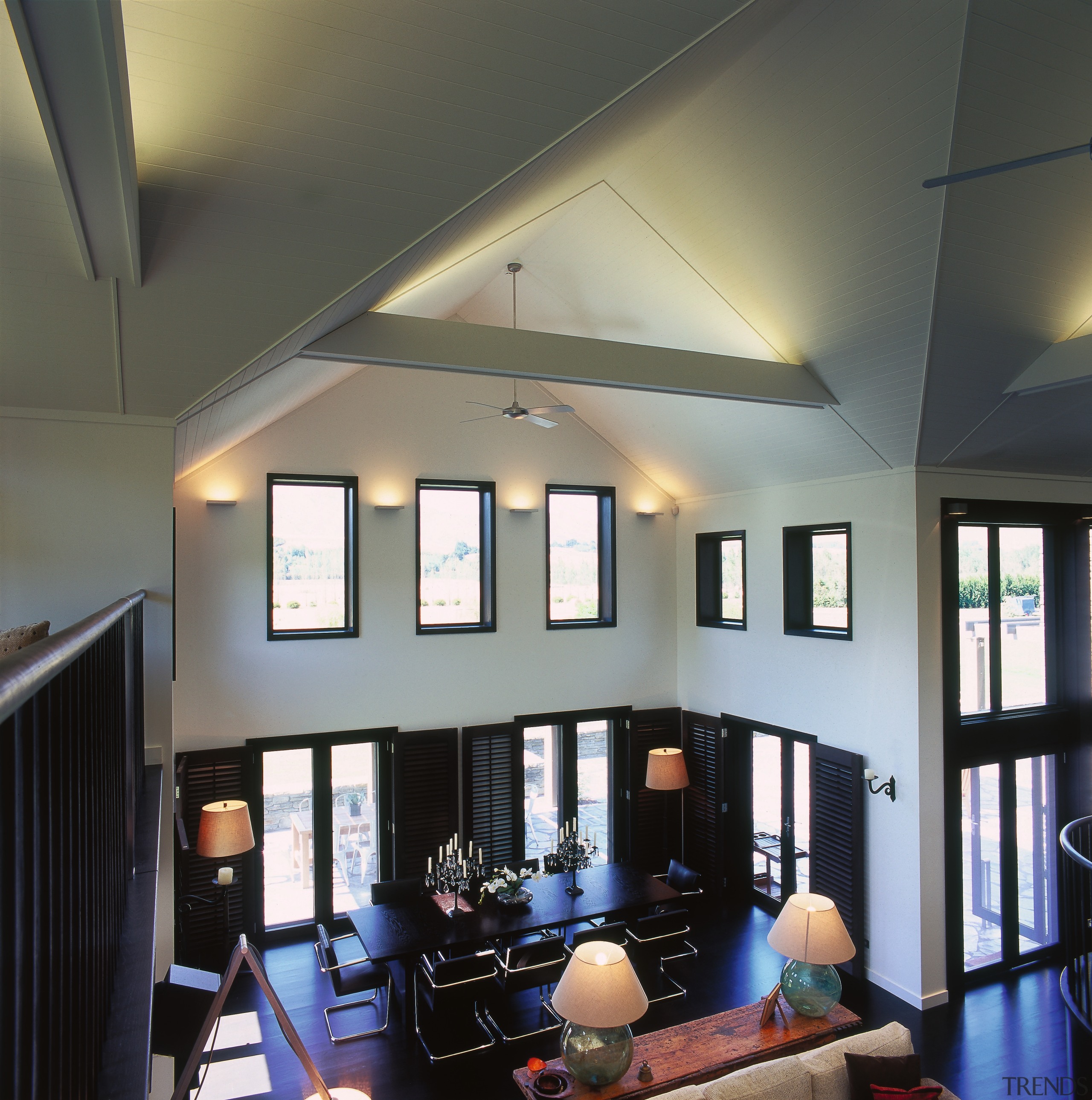 View from the top level looking down at ceiling, daylighting, interior design, light fixture, lighting, room, window, gray, black