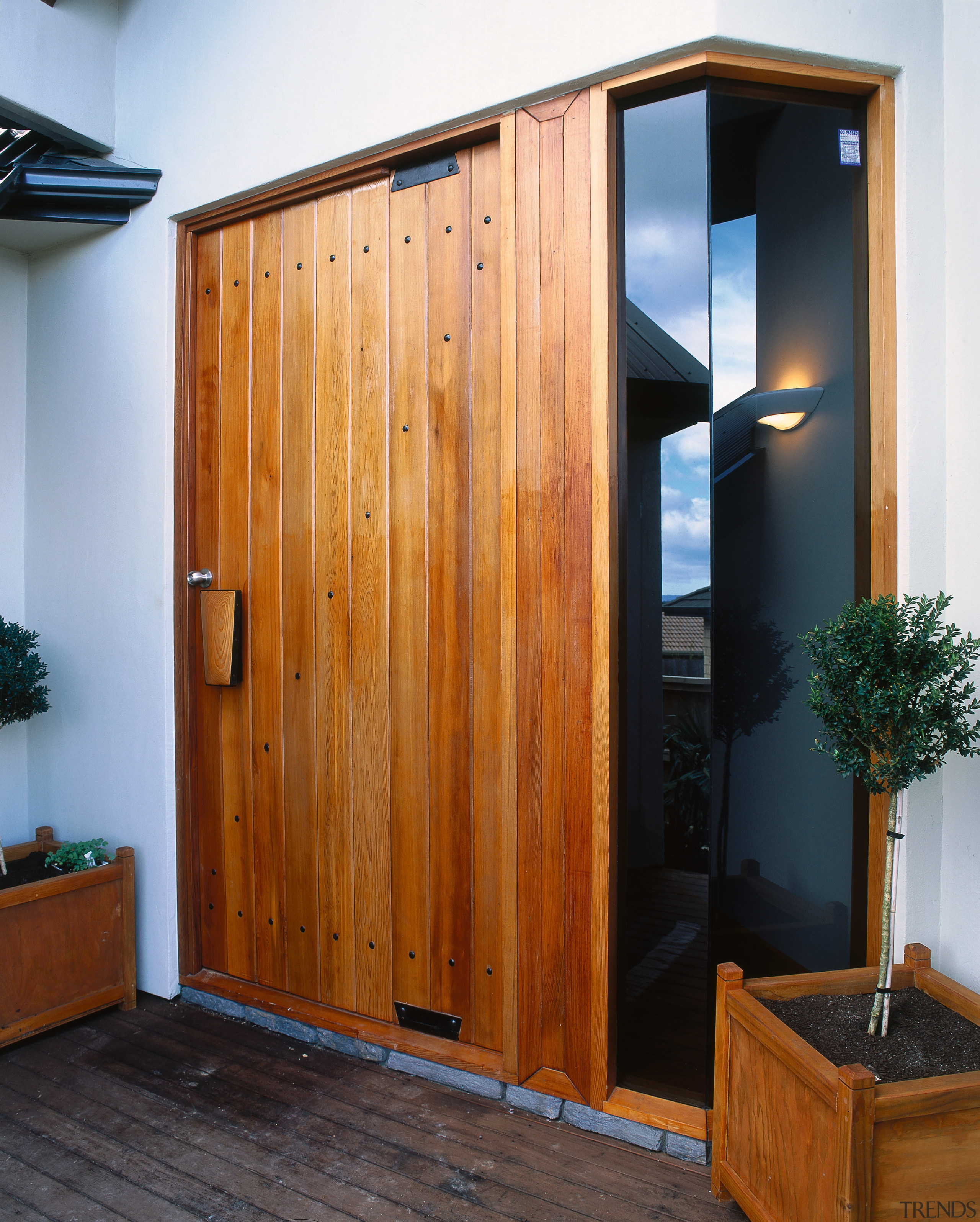 View of this traditional entrance - View of cabinetry, cupboard, door, furniture, wardrobe, wood, wood stain, brown