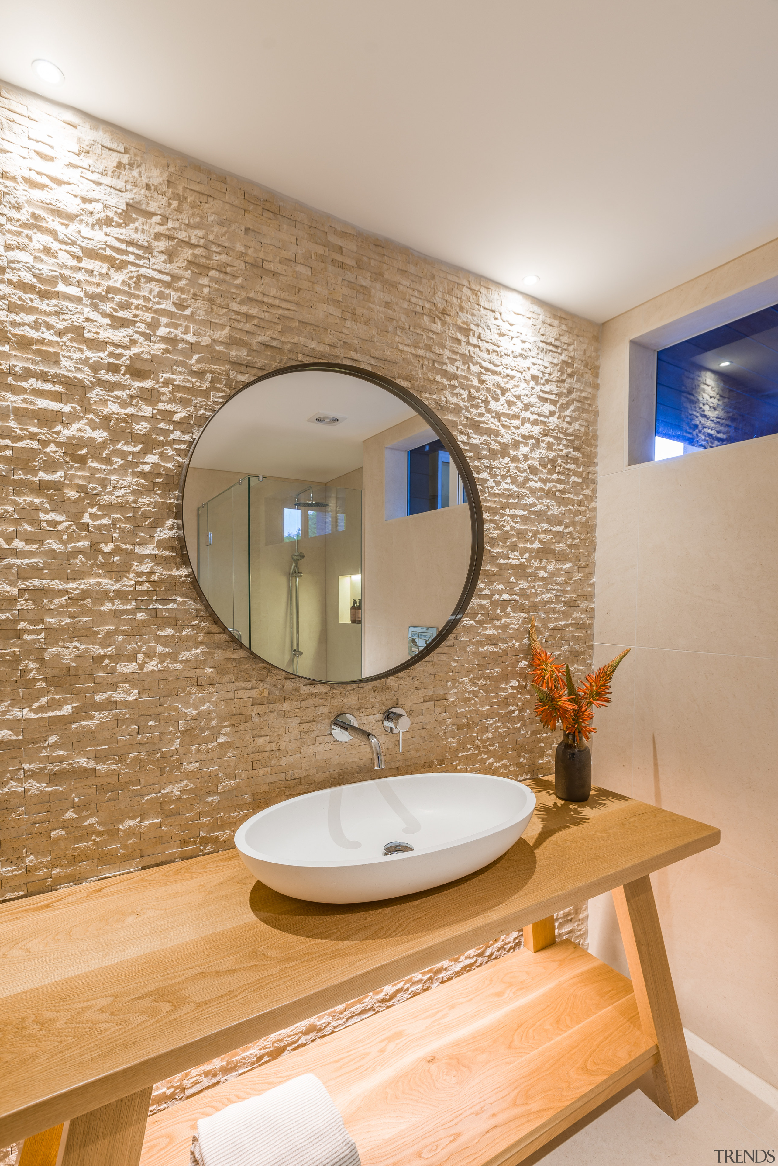 ​​​​​​​The split-face travertine wall was water-blasted in key bathroom, interior design, sink, Travertine, Natalie du Bois, design