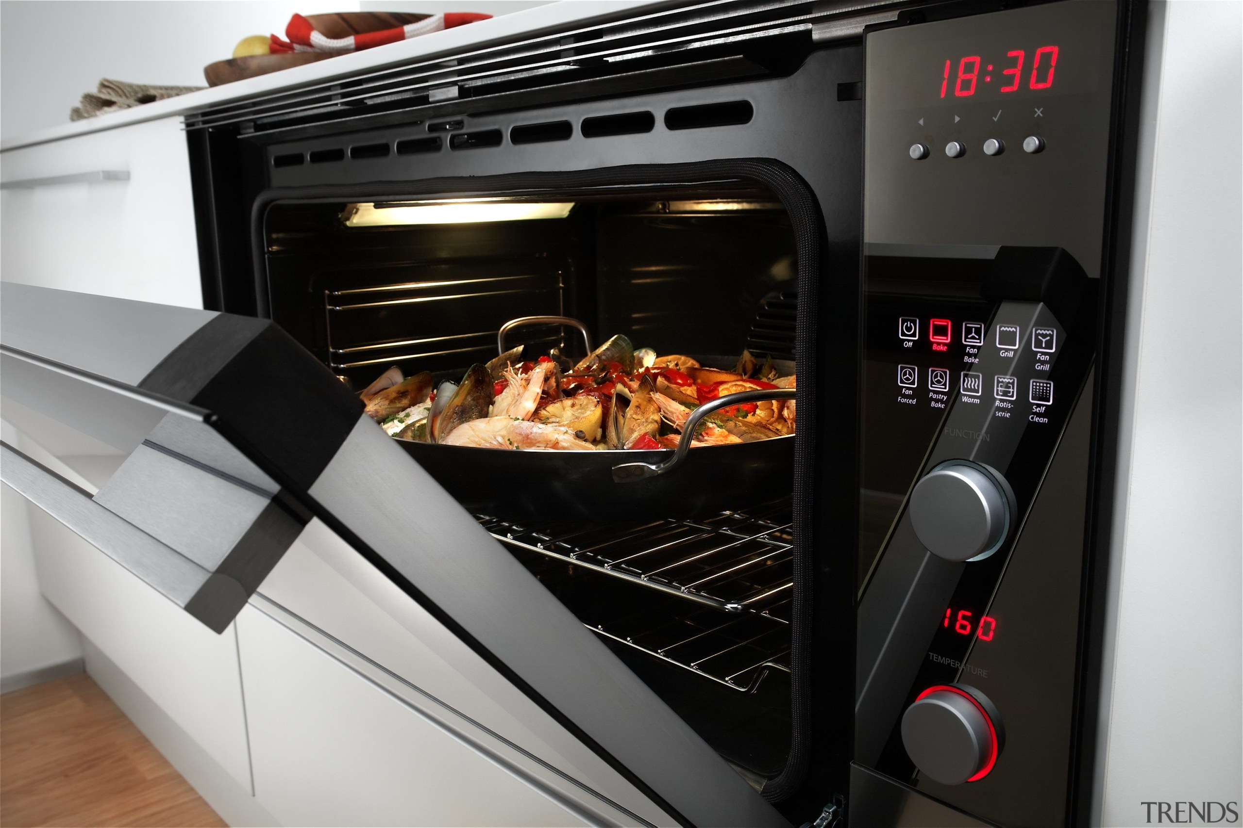 View of a kitchen which features appliances from home appliance, kitchen appliance, kitchen stove, oven, product, black