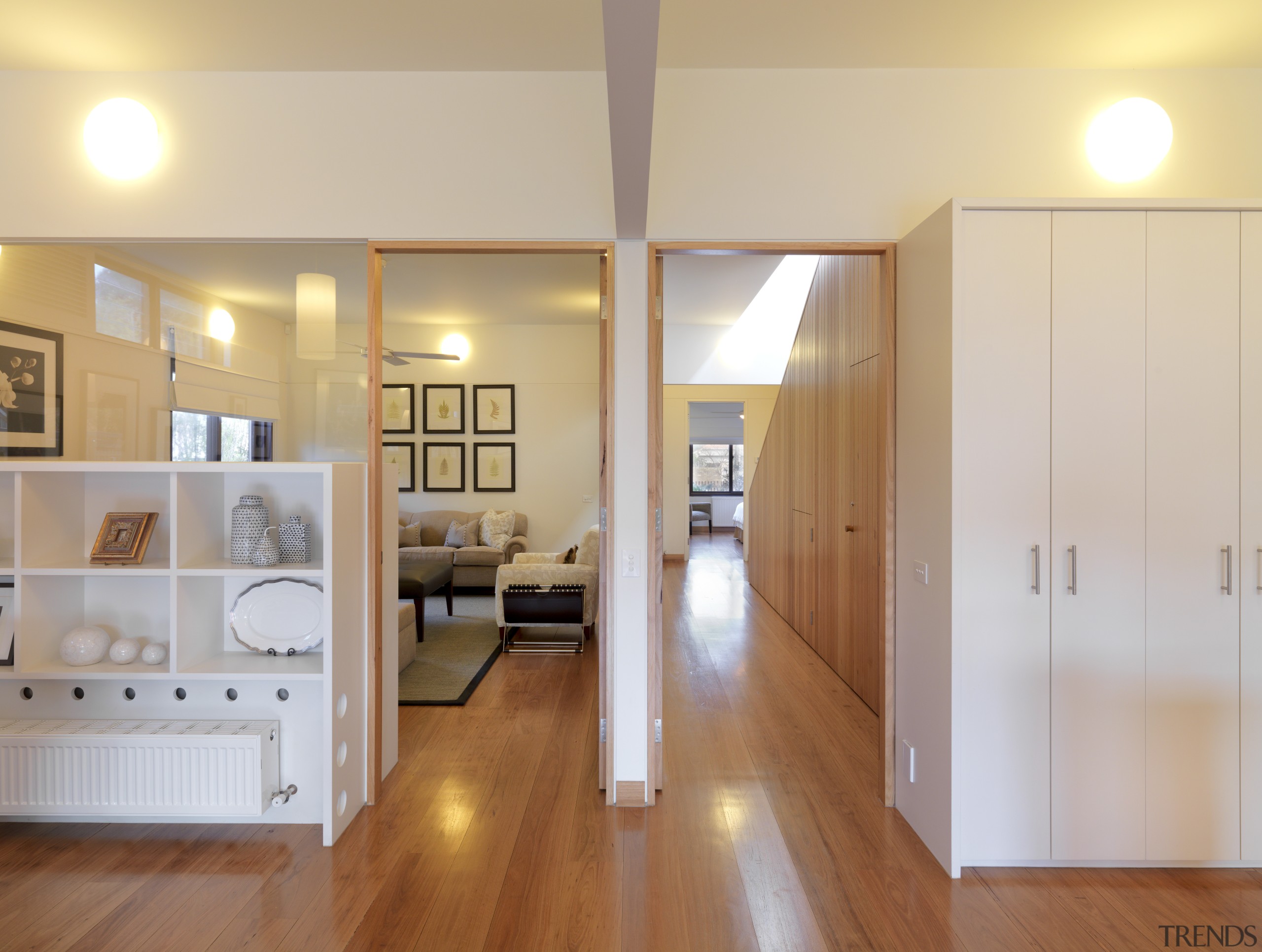 View of this contemporary remodeled lounge area - cabinetry, ceiling, door, floor, flooring, hardwood, home, interior design, laminate flooring, real estate, room, wall, wood, wood flooring, gray, orange