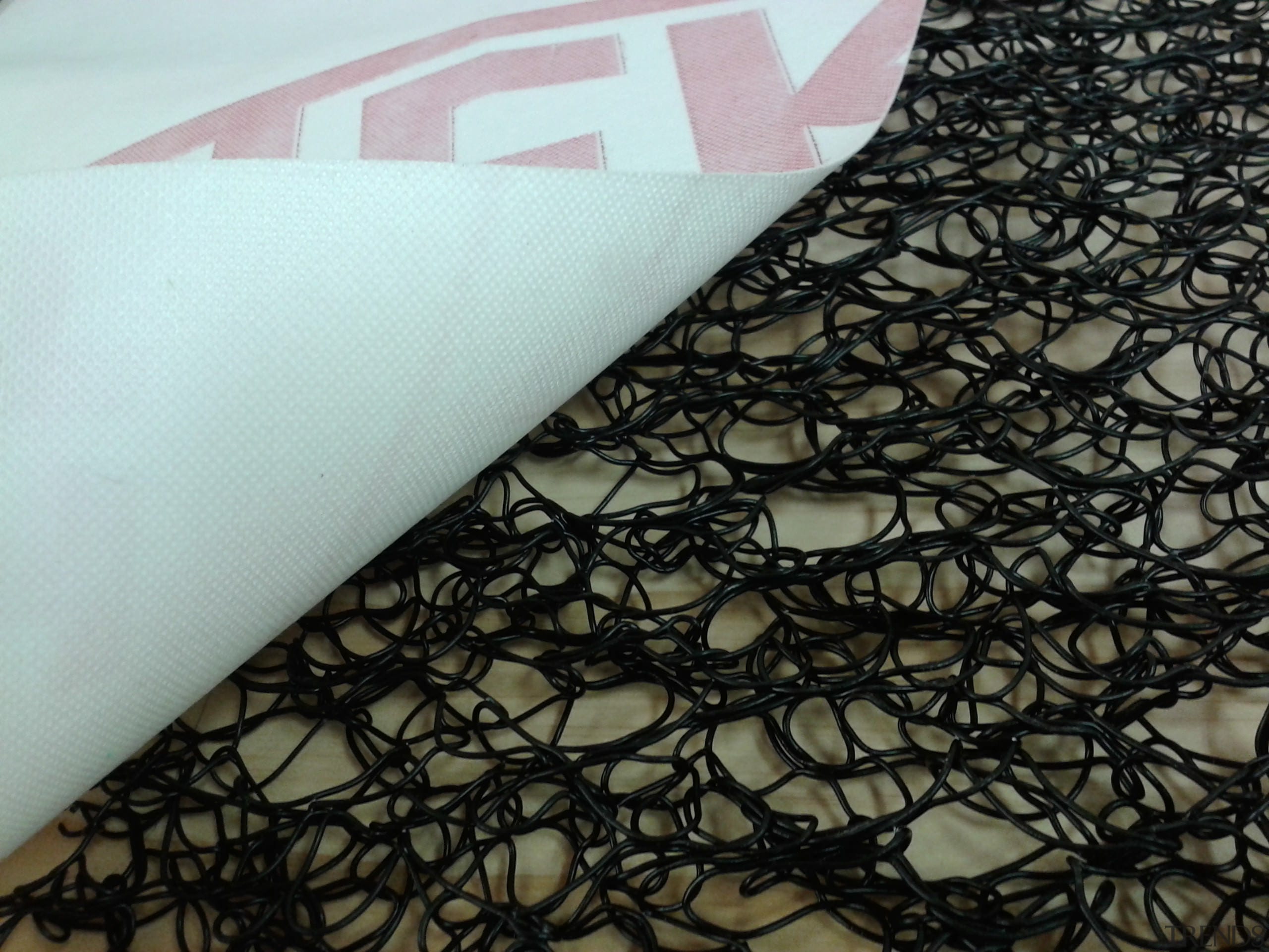 Thermakraft introduced the first synthetic roofing underlay in material, pattern, textile, black