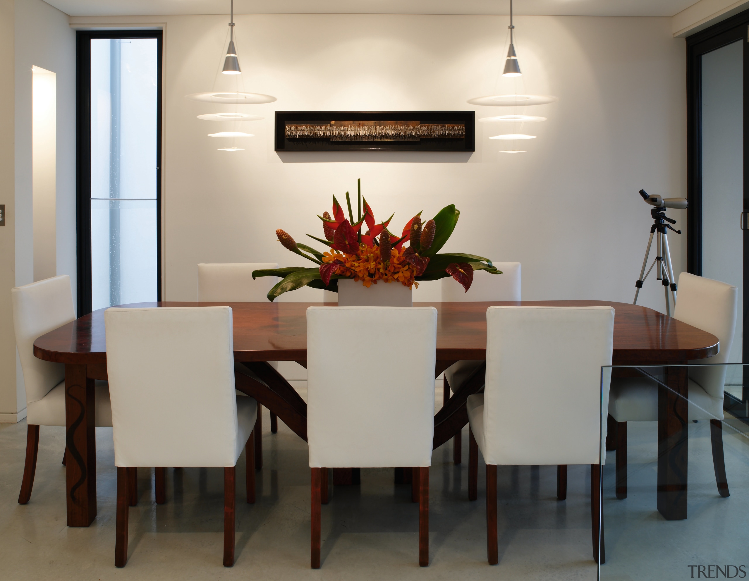 A view of the dining area featuring stained dining room, furniture, interior design, room, table, gray