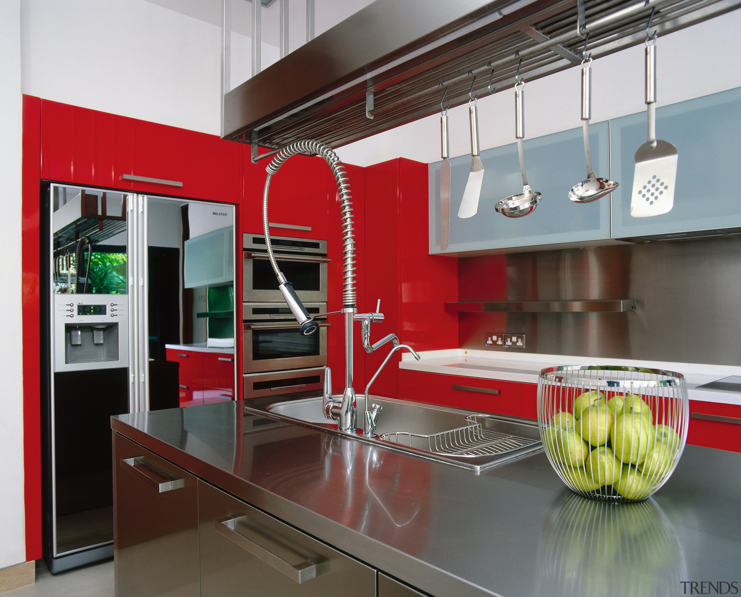 view of this kitchen featuring bright red cabinetry/ countertop, interior design, kitchen, gray