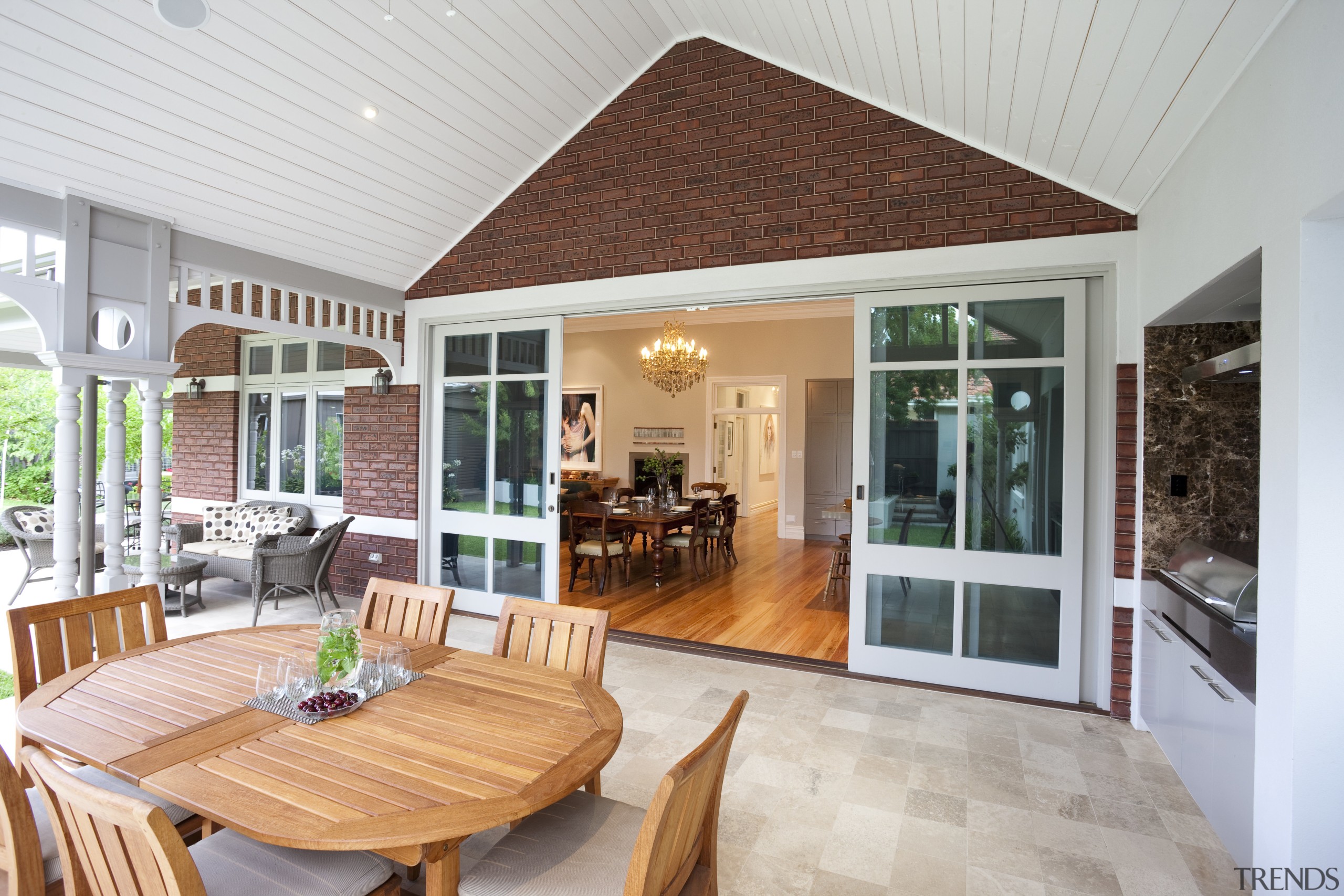 View of covered outdoor deck and into the estate, home, interior design, living room, patio, porch, property, real estate, window, gray