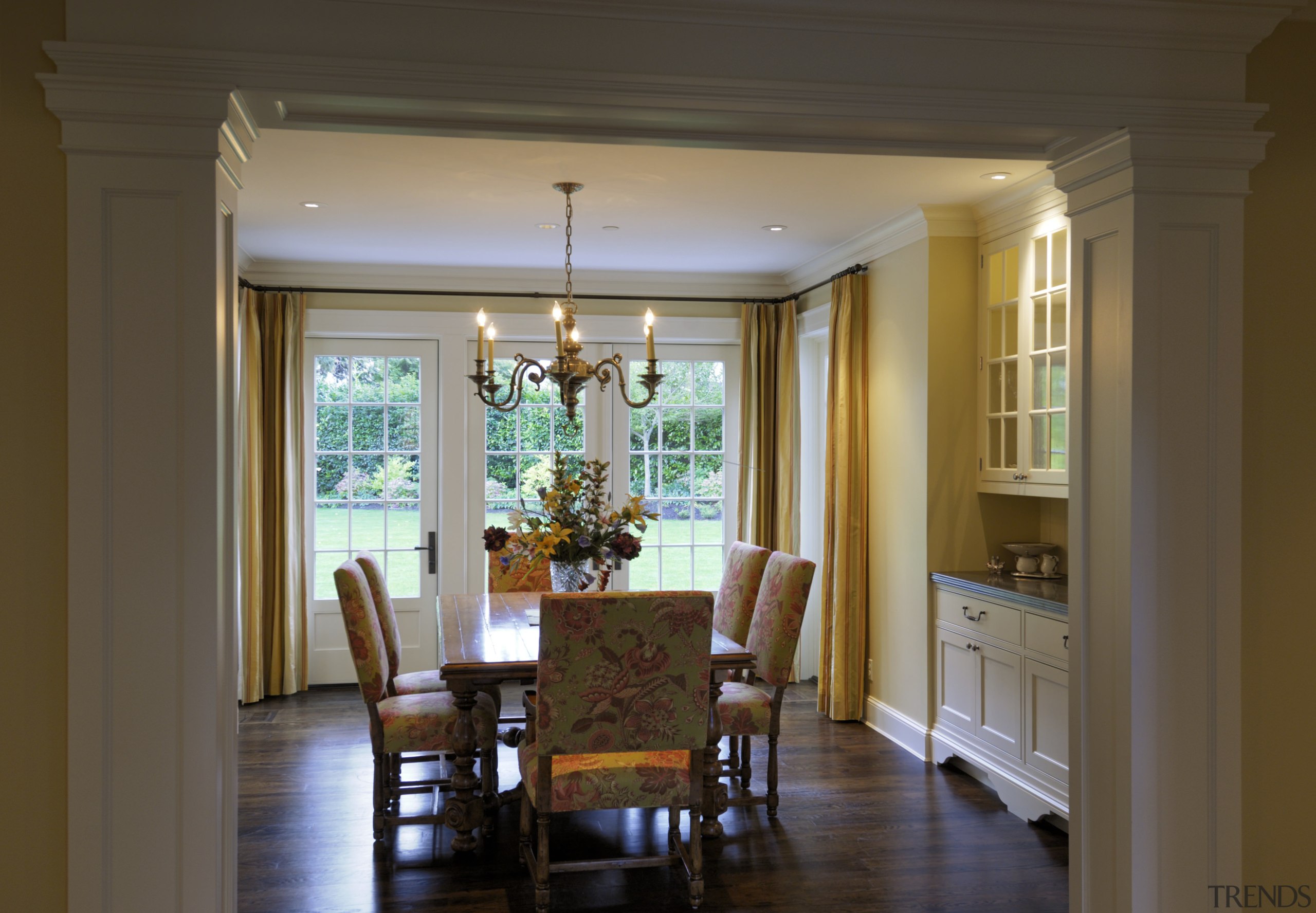 View of the dining room from the bottom ceiling, column, dining room, door, estate, floor, hardwood, home, house, interior design, living room, molding, real estate, room, wall, window, wood flooring, brown