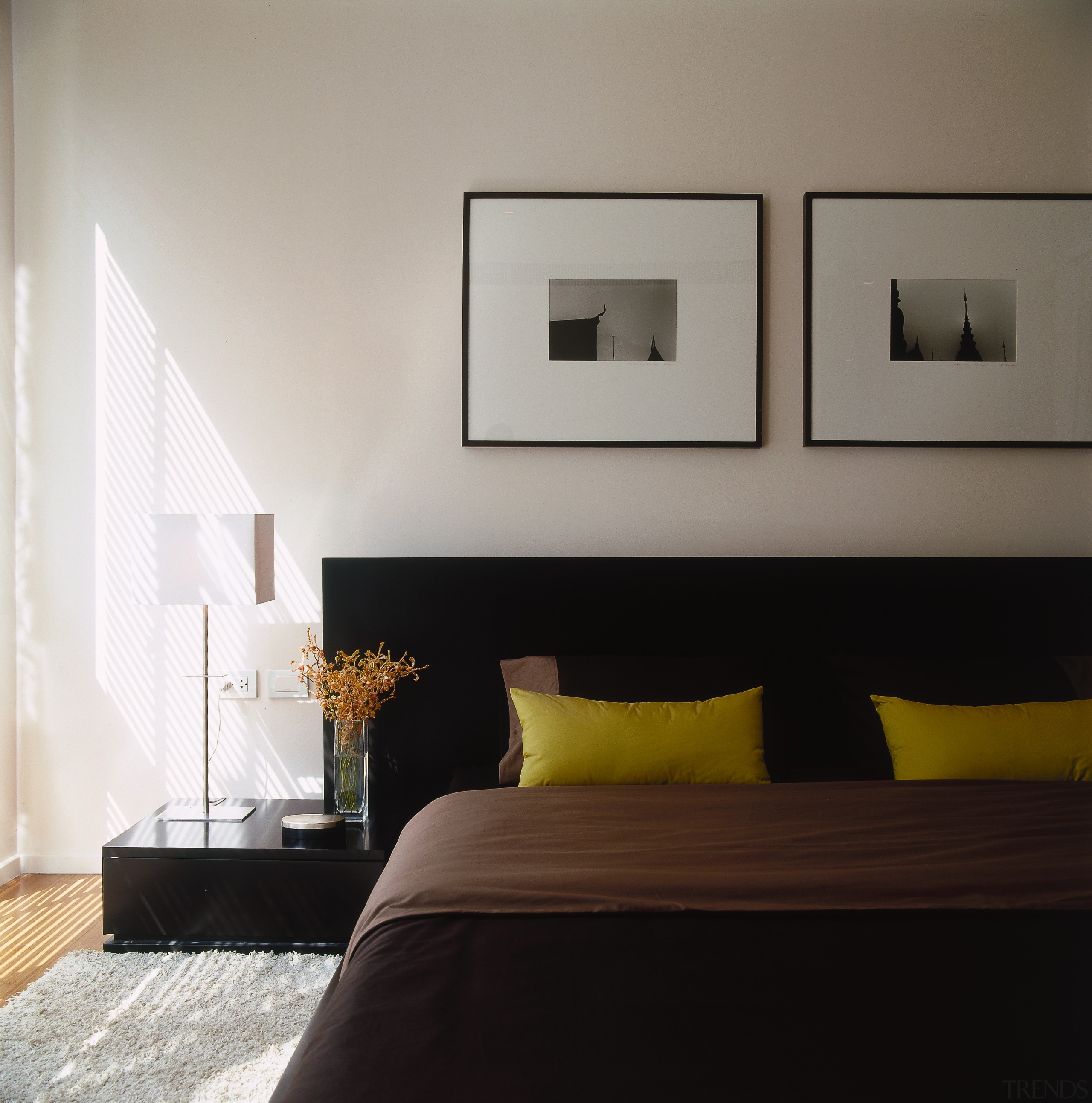 Close up view of the bedroom, white walls, bed frame, bedroom, ceiling, floor, furniture, home, interior design, lighting, living room, room, wall, gray, black