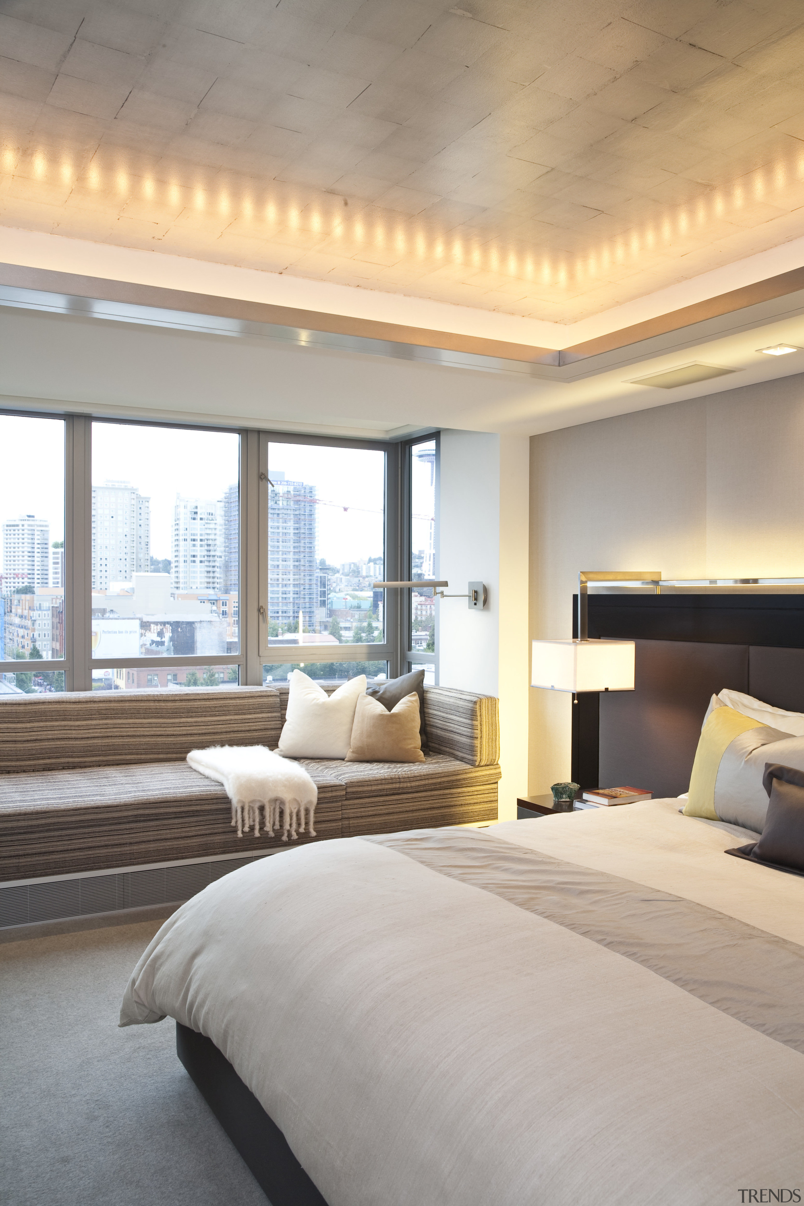 View of the master bedroom featuring bed with architecture, bed frame, bedroom, ceiling, estate, floor, home, interior design, real estate, room, suite, wall, window, wood, gray