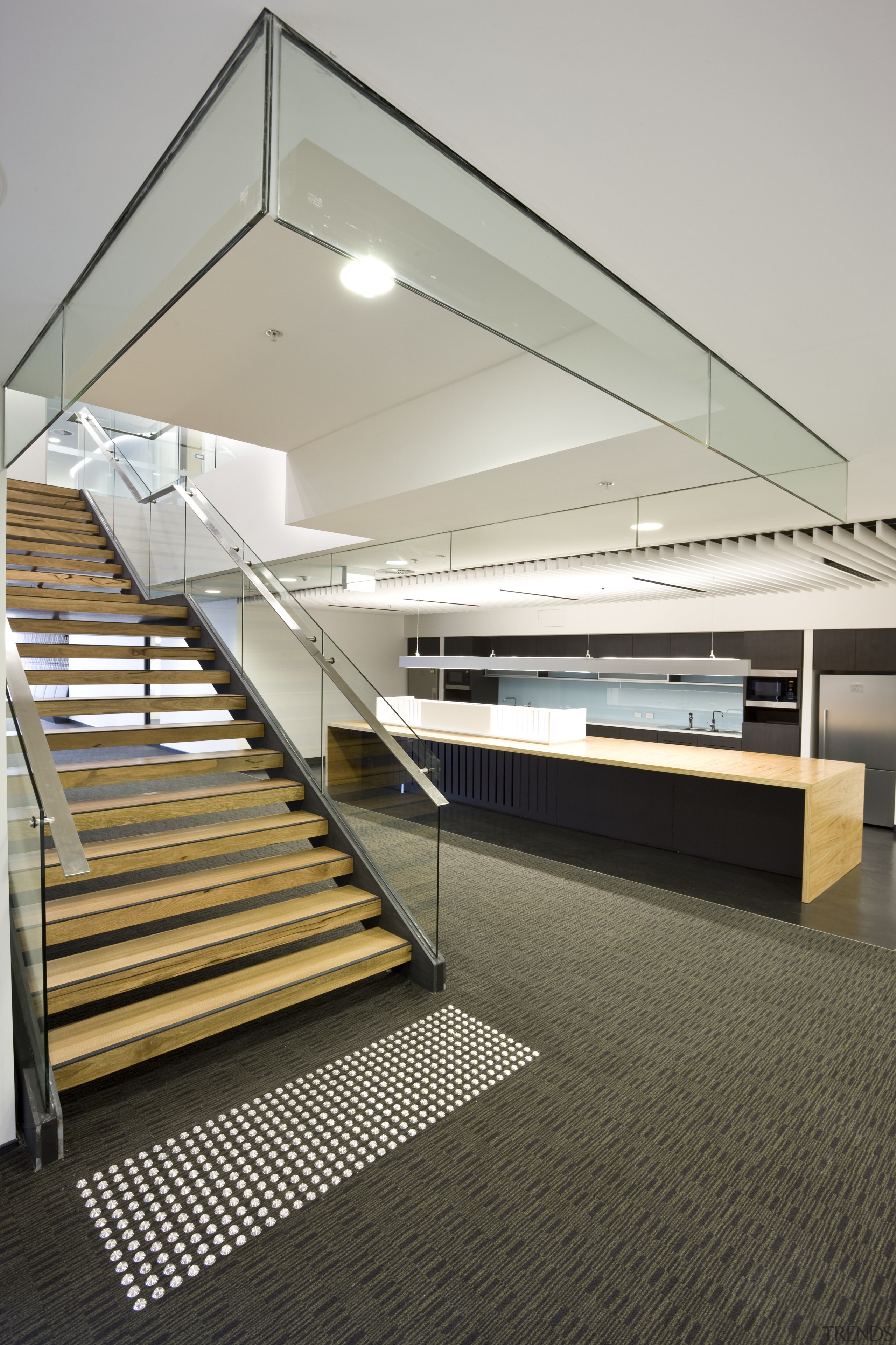 Interior view of the eco-friendly offices which were architecture, daylighting, floor, flooring, glass, handrail, house, interior design, product design, stairs, gray