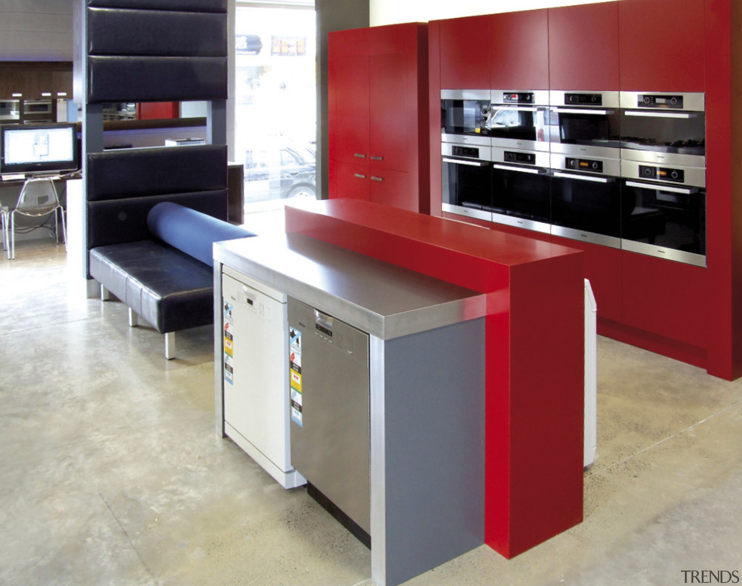 View of a Kitchen Things showroom which features countertop, furniture, kitchen, product design, table, gray, red