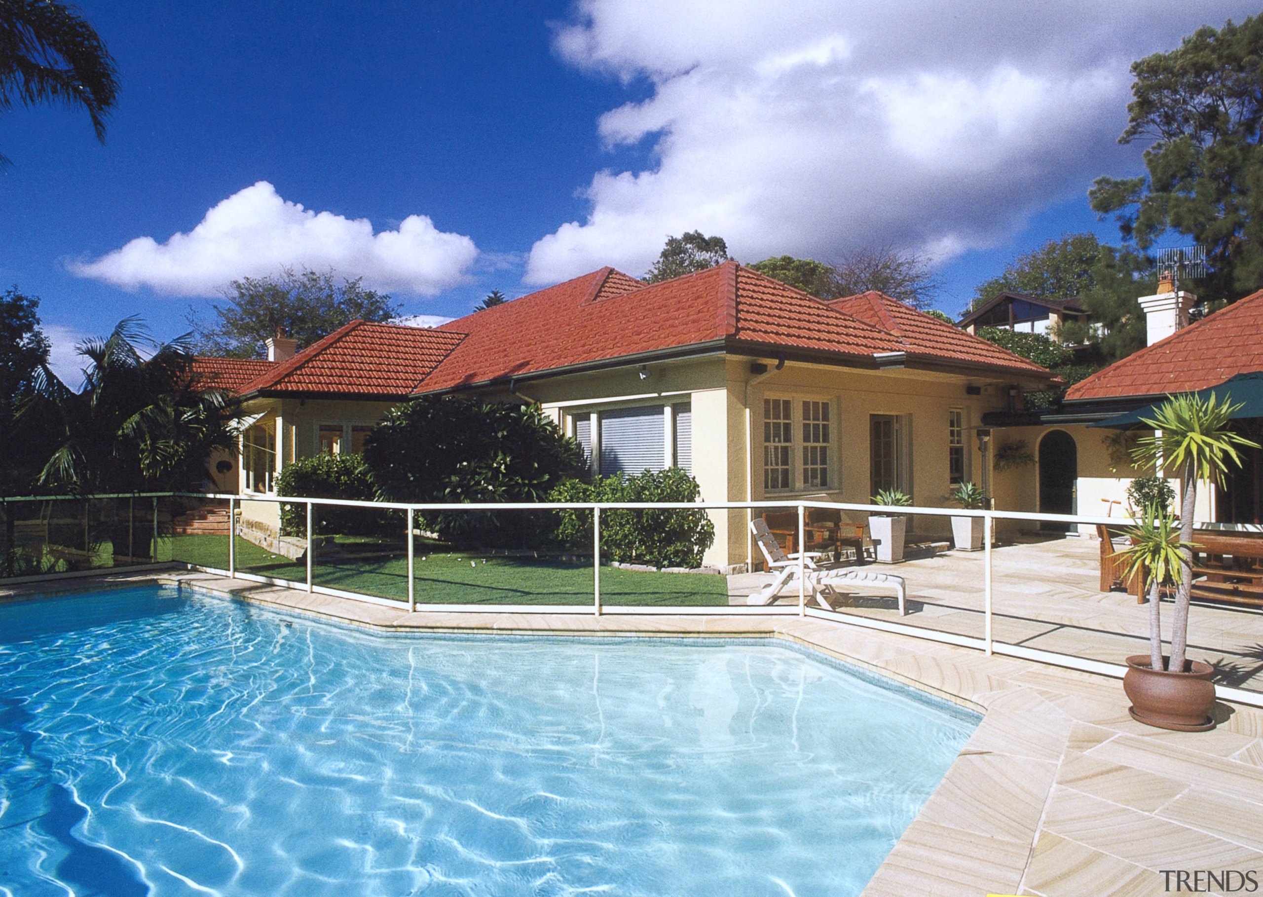 Due to a disjointed floor plan, the new cottage, estate, facade, hacienda, home, house, leisure, property, real estate, resort, sky, swimming pool, villa, teal