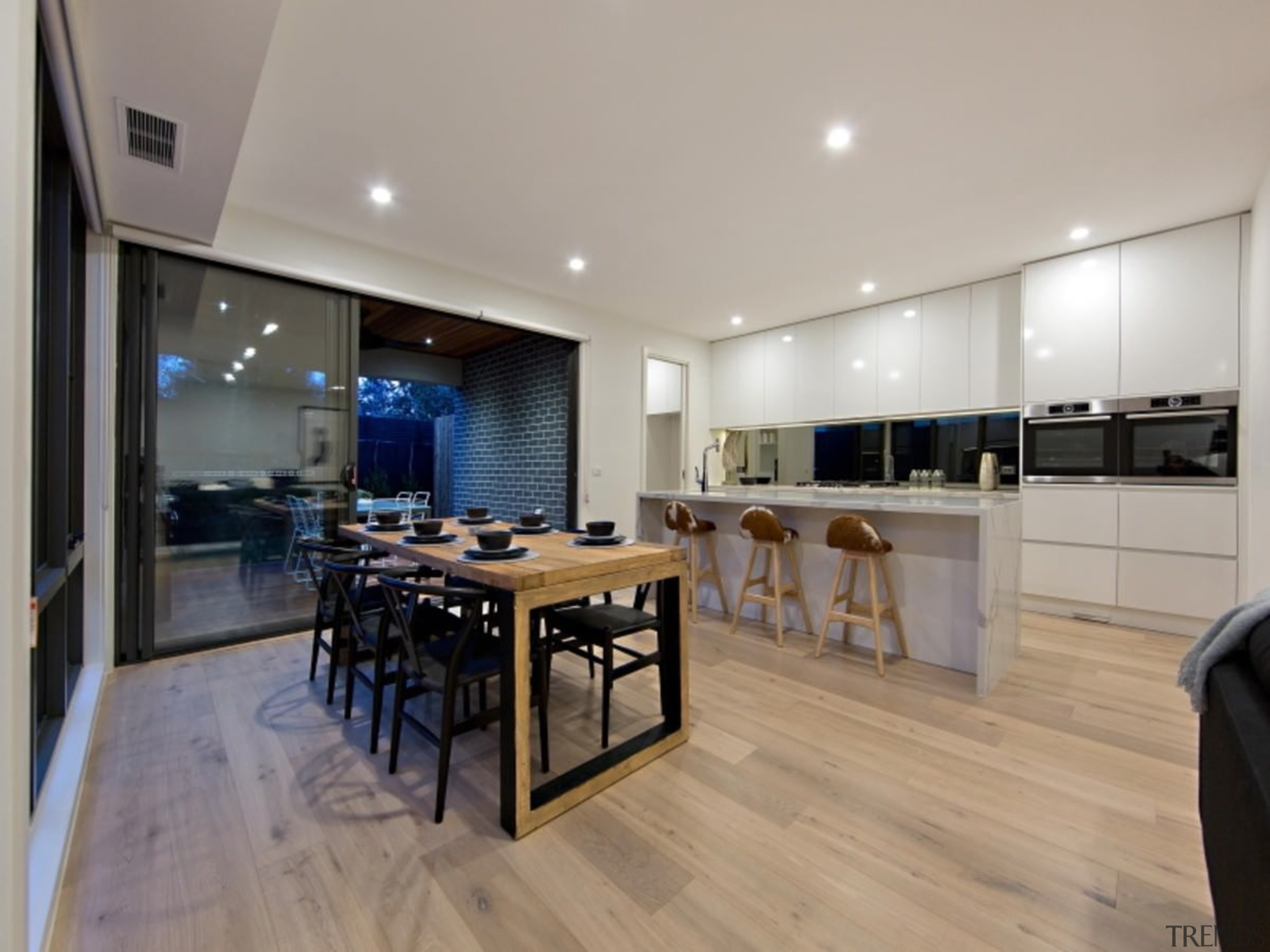 There's ample room for entertaining in the kitchen countertop, floor, flooring, interior design, kitchen, property, real estate, wood flooring, gray