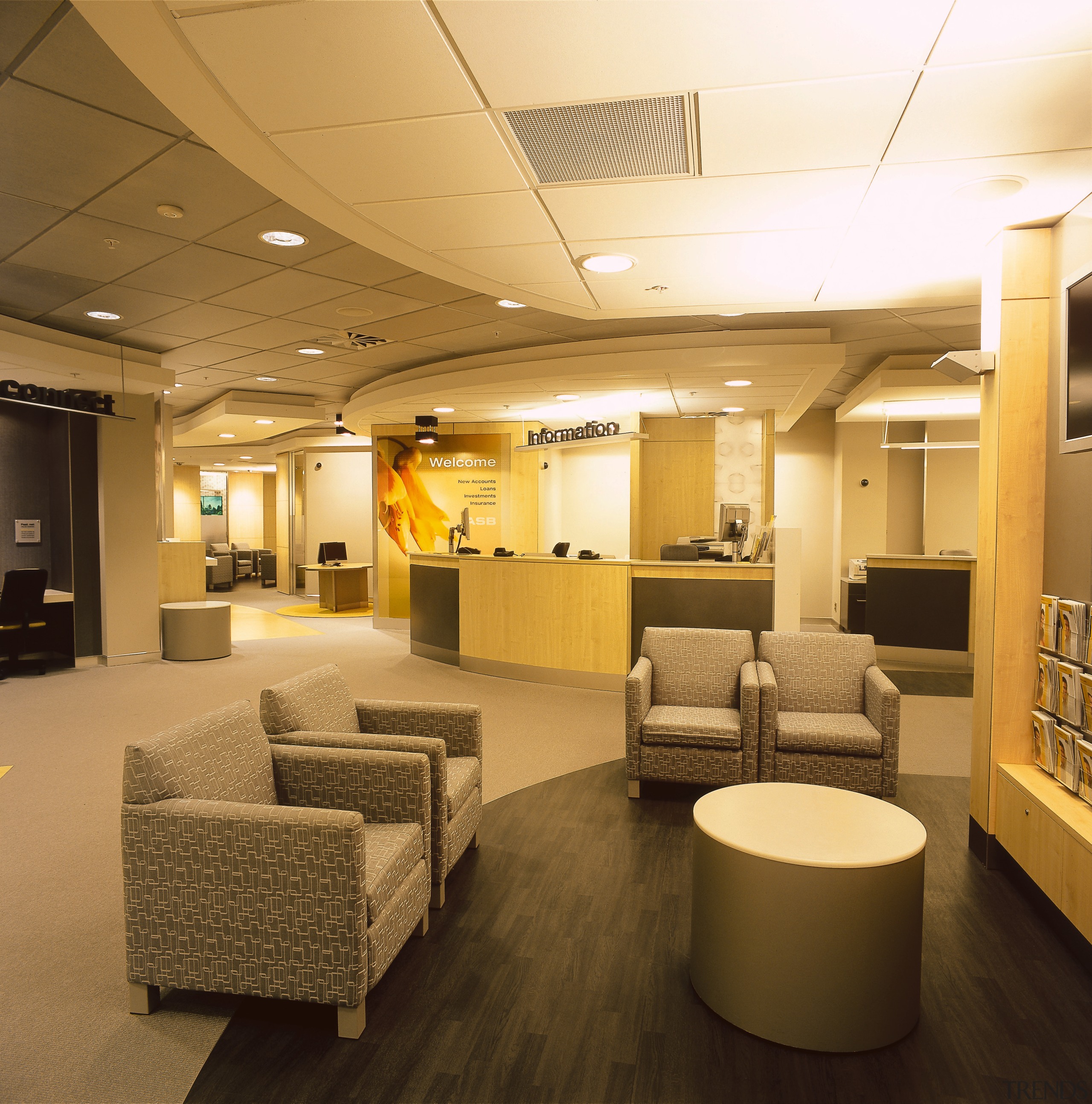 Foyer of bank with armchairs and table, and ceiling, interior design, lobby, brown, orange