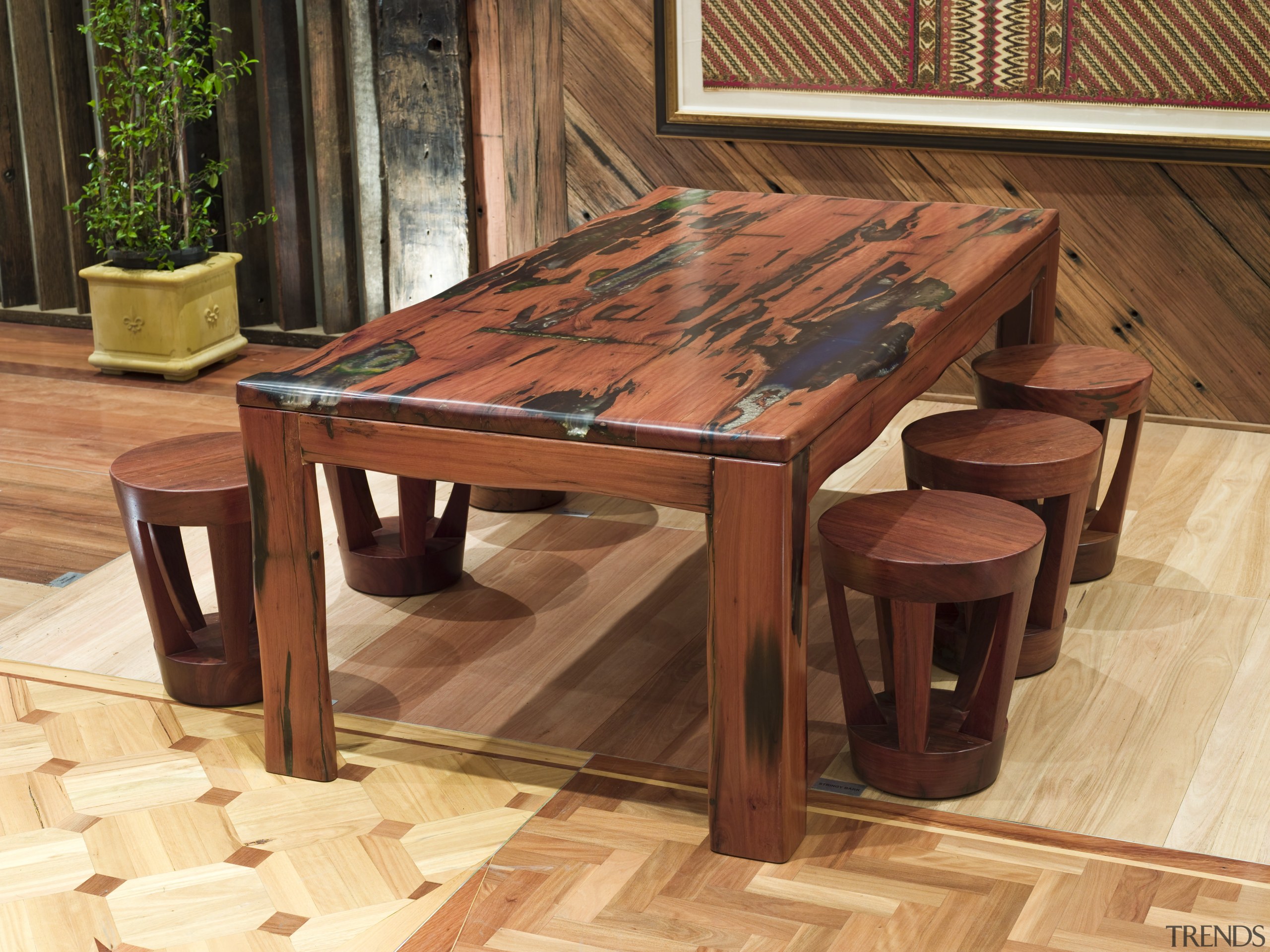 View of a table created by Ironwood Antique coffee table, end table, floor, flooring, furniture, hardwood, table, wood, wood stain, brown, orange