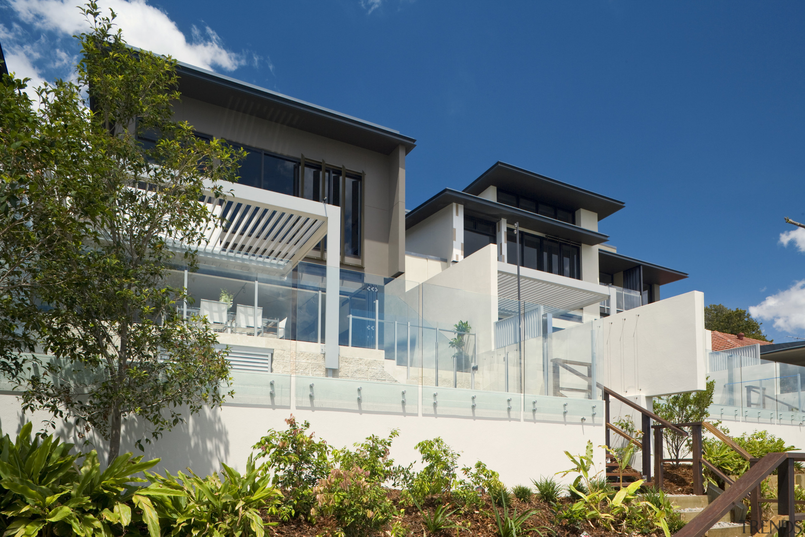 View of the Norman Reach development which is apartment, architecture, building, condominium, elevation, estate, facade, home, house, property, real estate, residential area, villa, blue