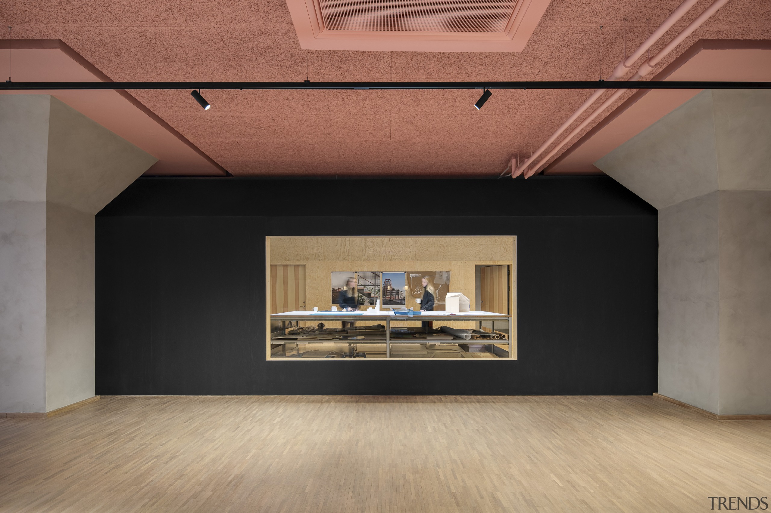 A large picture window reveals the inner workings 