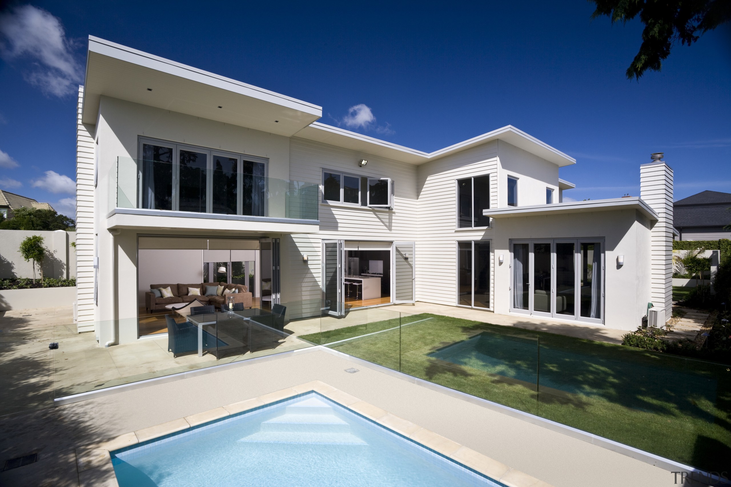 Image of the exterior home designed by Principle architecture, elevation, estate, facade, home, house, mansion, property, real estate, residential area, swimming pool, villa, window, white, blue