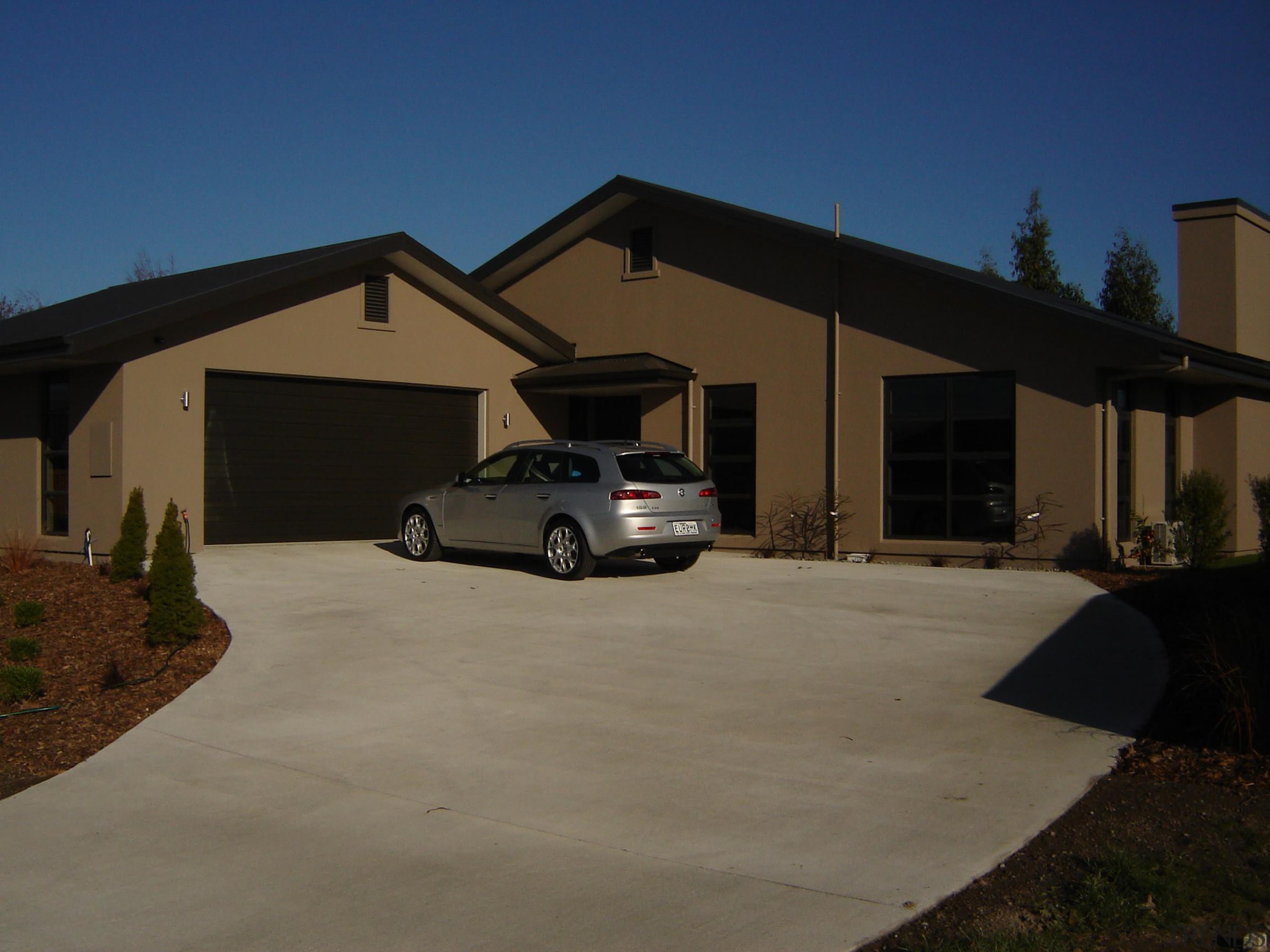 Contemporary design 'Freeman' clad in plasterFowler Homes have asphalt, automotive exterior, building, car, estate, facade, family car, garage, home, house, luxury vehicle, motor vehicle, property, real estate, residential area, roof, siding, suburb, vehicle, window, black, blue