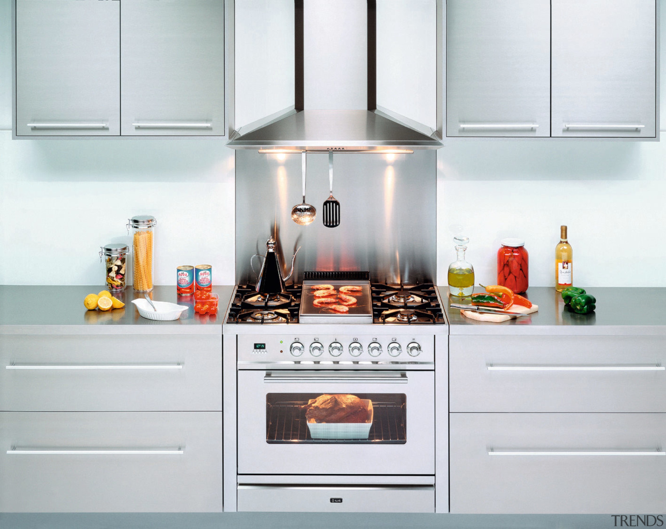 Ilve's Quadra and Nostalgie gas ovens offer expansive cabinetry, countertop, cuisine classique, gas stove, home appliance, interior design, kitchen, kitchen appliance, kitchen stove, major appliance, refrigerator, room, small appliance, white