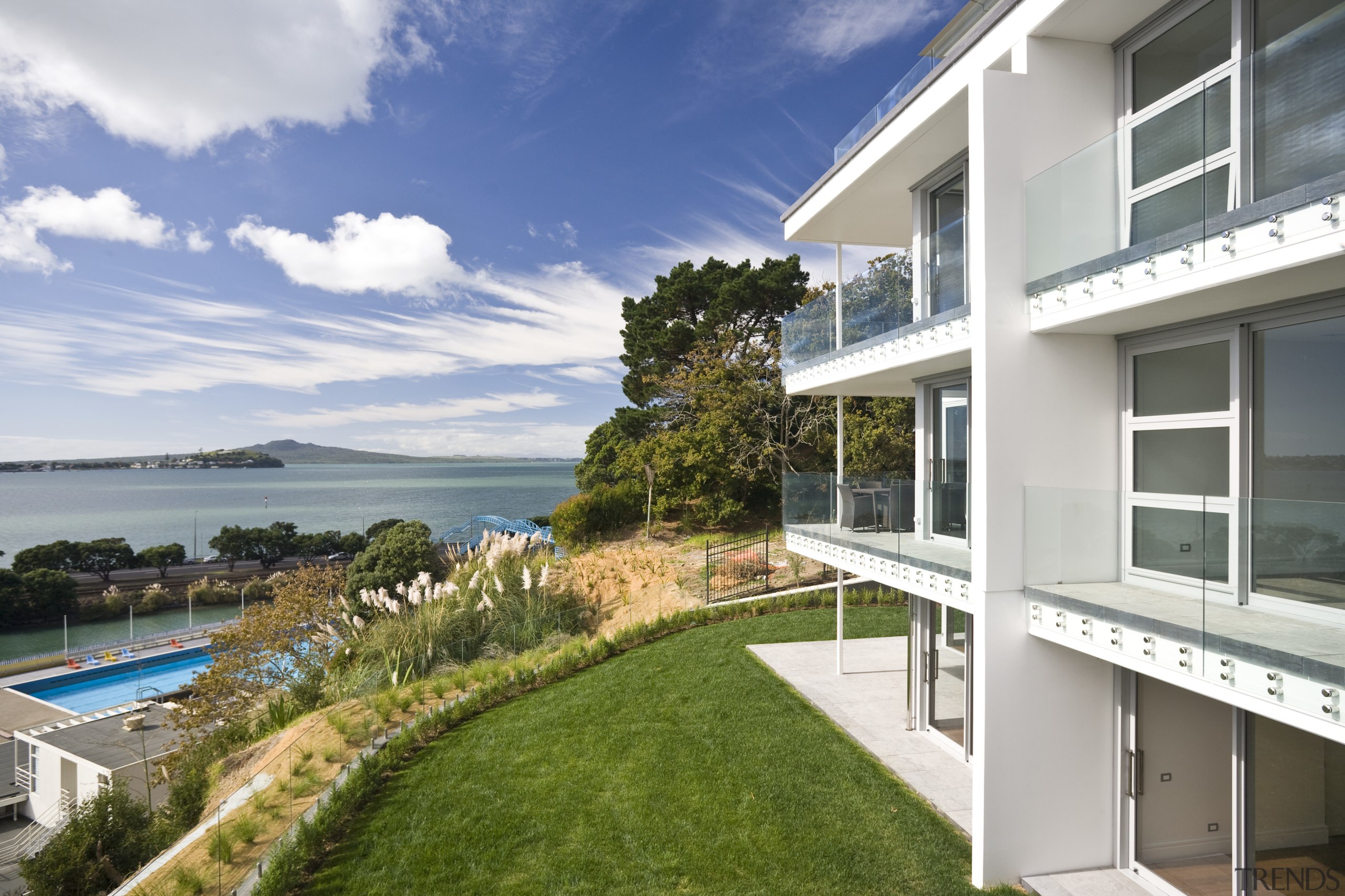 Exterior view of a Parnell apartment complex which apartment, condominium, estate, home, house, property, real estate, residential area, villa, white