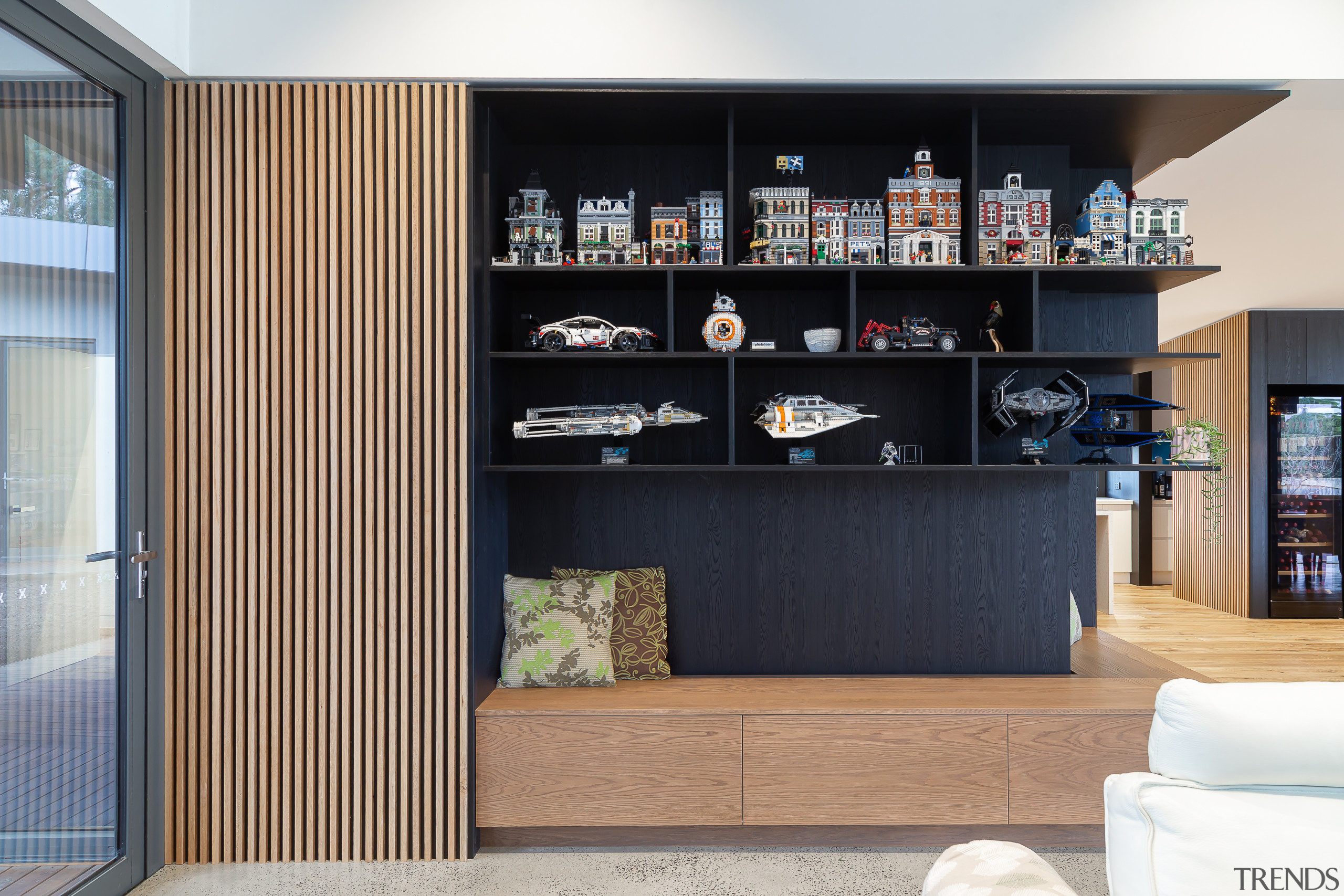 ​​​​​​​A comprehensive joinery element with storage and display black, white