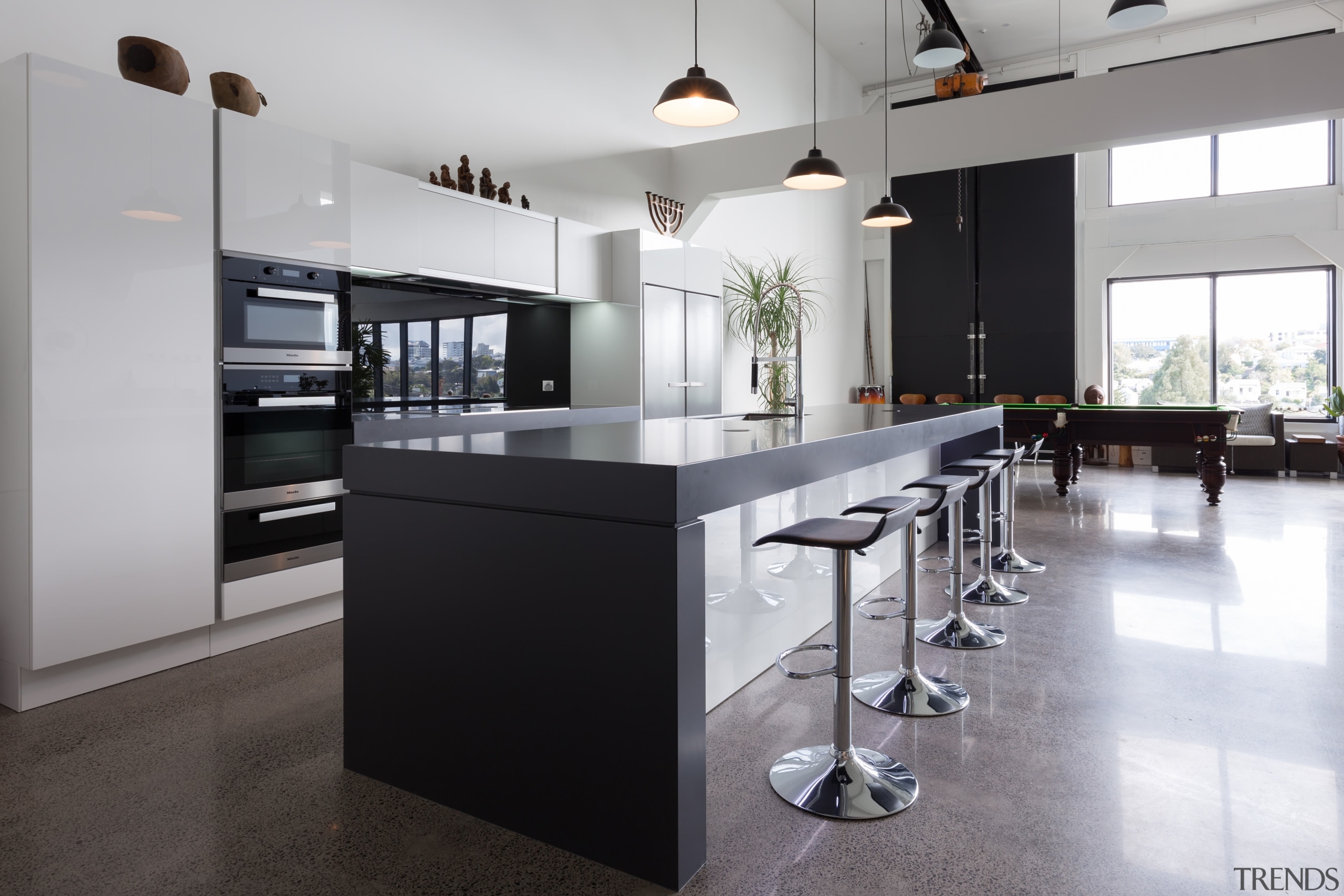 This kitchen is positioned a reasonable distance from countertop, floor, flooring, interior design, kitchen, real estate, gray, black