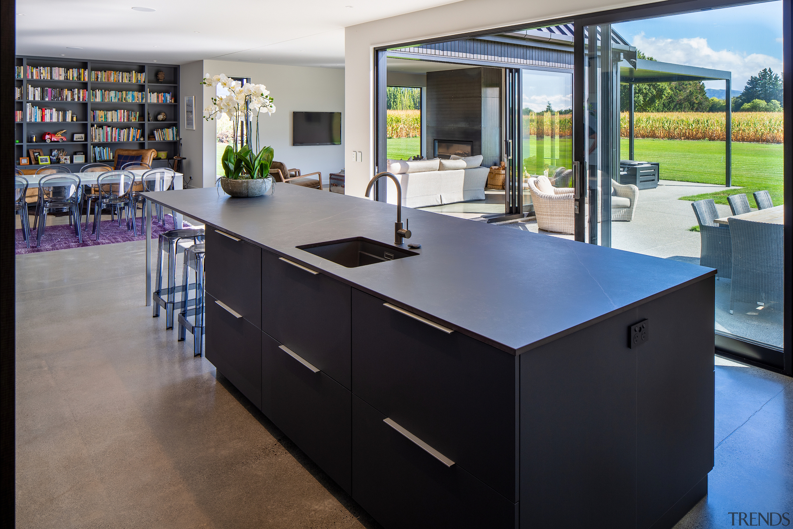The kitchen looks out on the owners' maize 