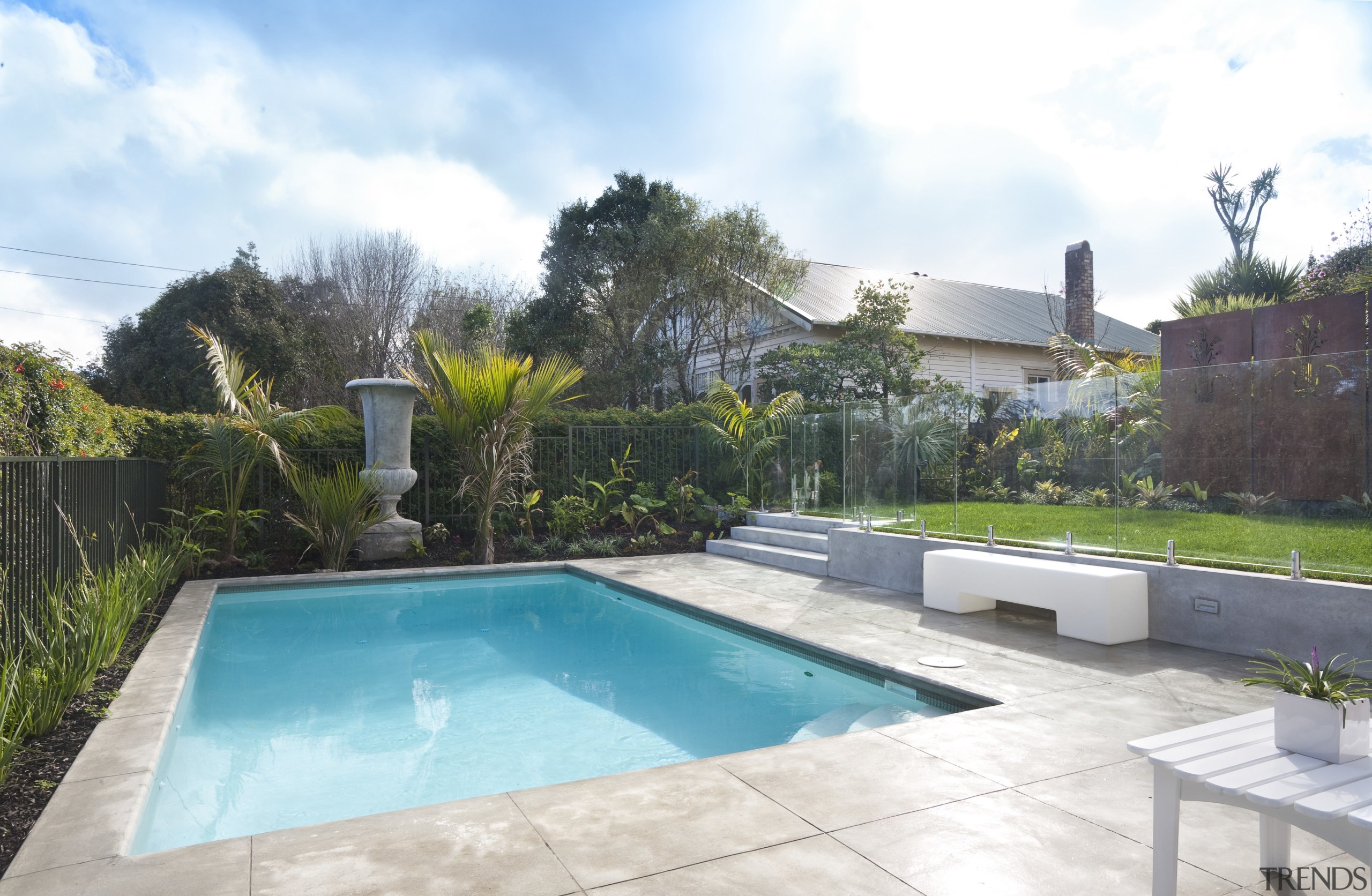 Exterior view of traditional pool area. Features small backyard, estate, home, house, leisure, property, real estate, residential area, swimming pool, villa, yard, white