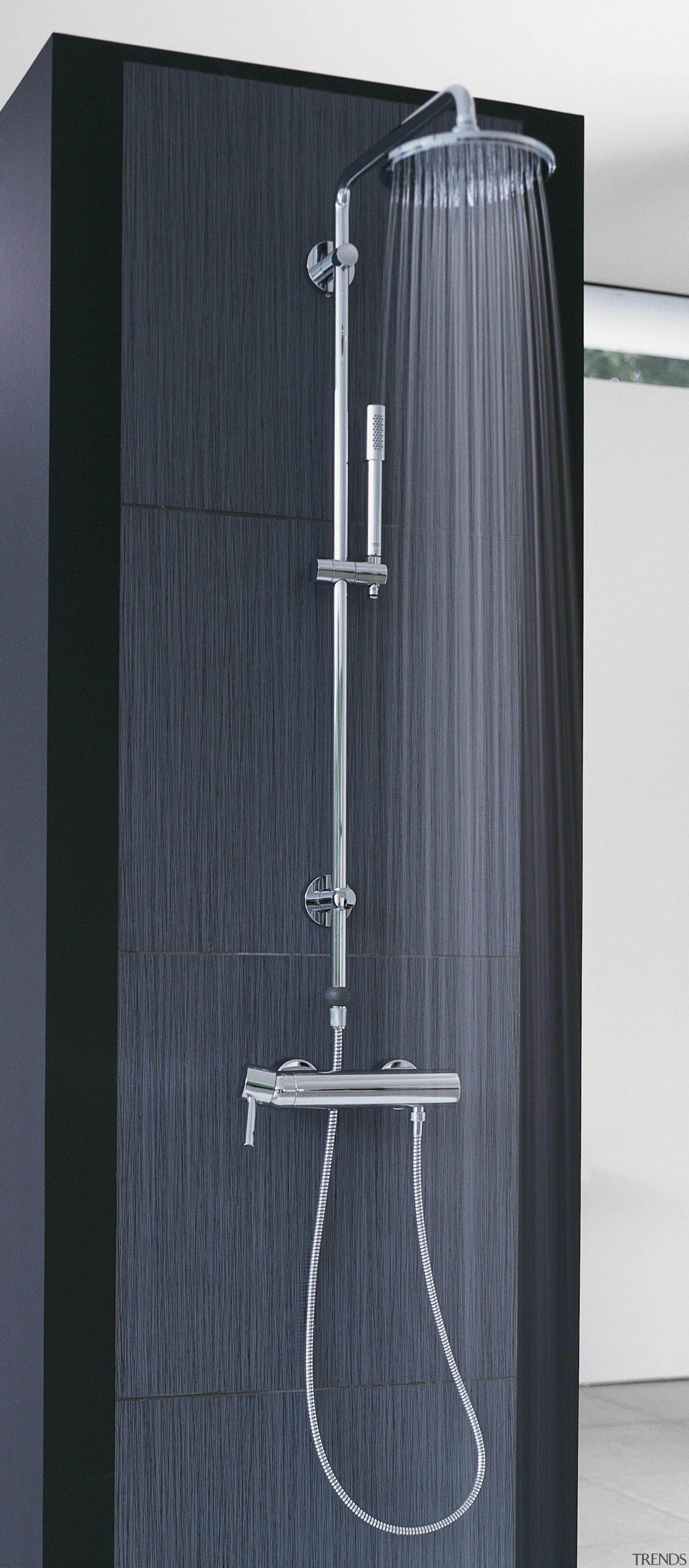 View of contemporary bathroom fixtures. - View of plumbing fixture, product design, shower, tap, black, gray