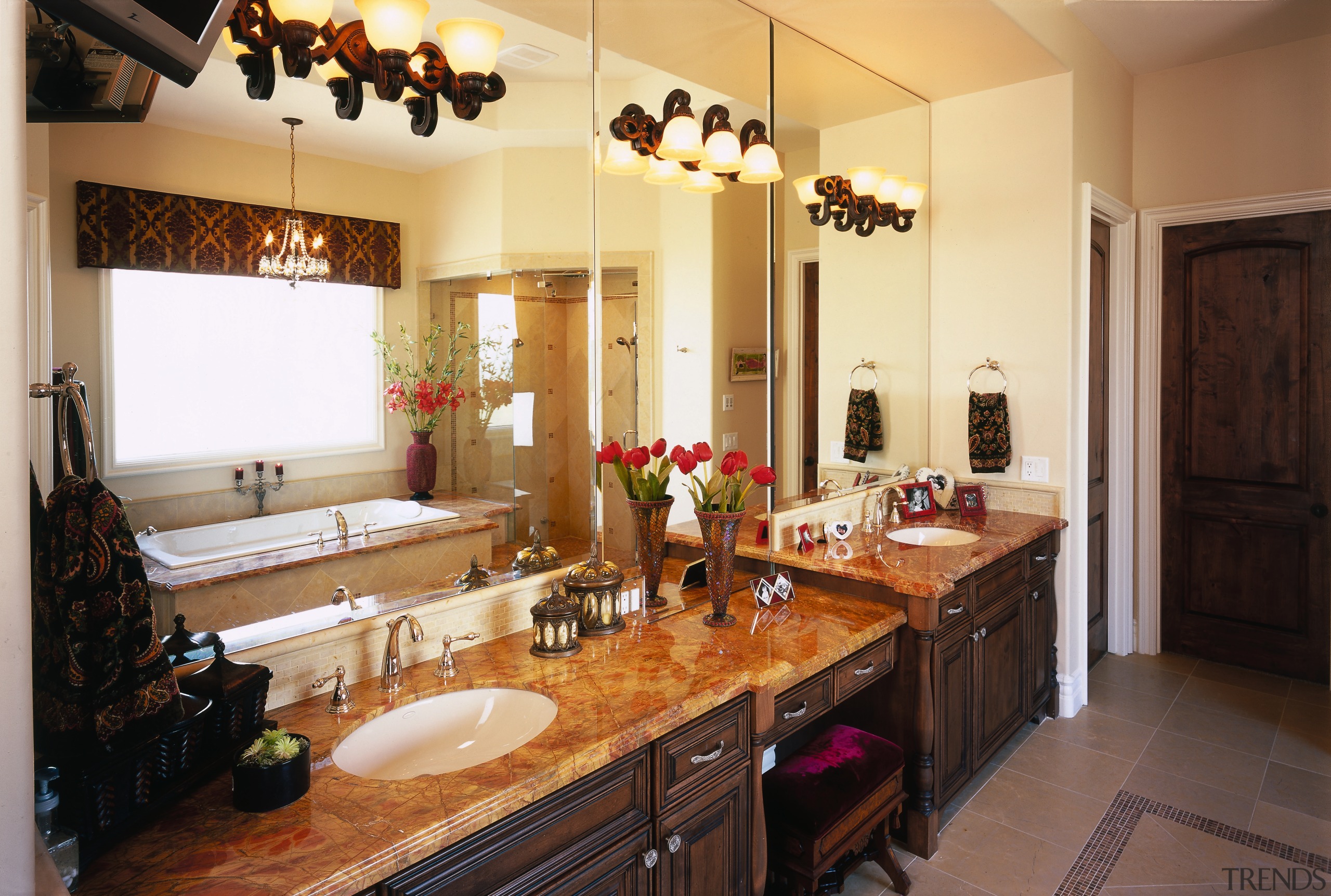 view of this bathroom shwoing the warm tones bathroom, cabinetry, countertop, cuisine classique, home, interior design, kitchen, real estate, room, window, orange