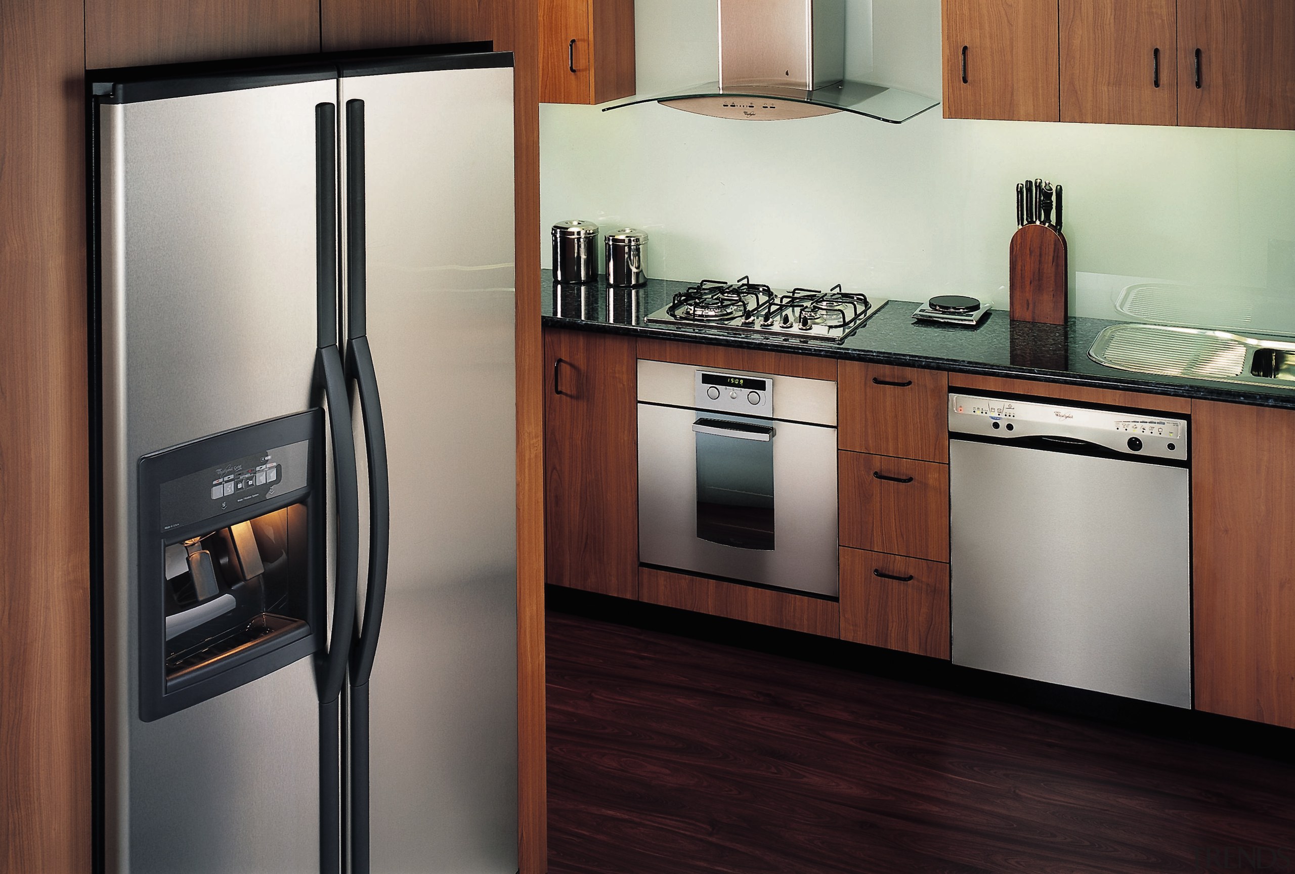 kitchen with timber cabinetry and stainless steel refrigerator, cabinetry, countertop, home appliance, kitchen, kitchen appliance, major appliance, product, refrigerator, gray, black