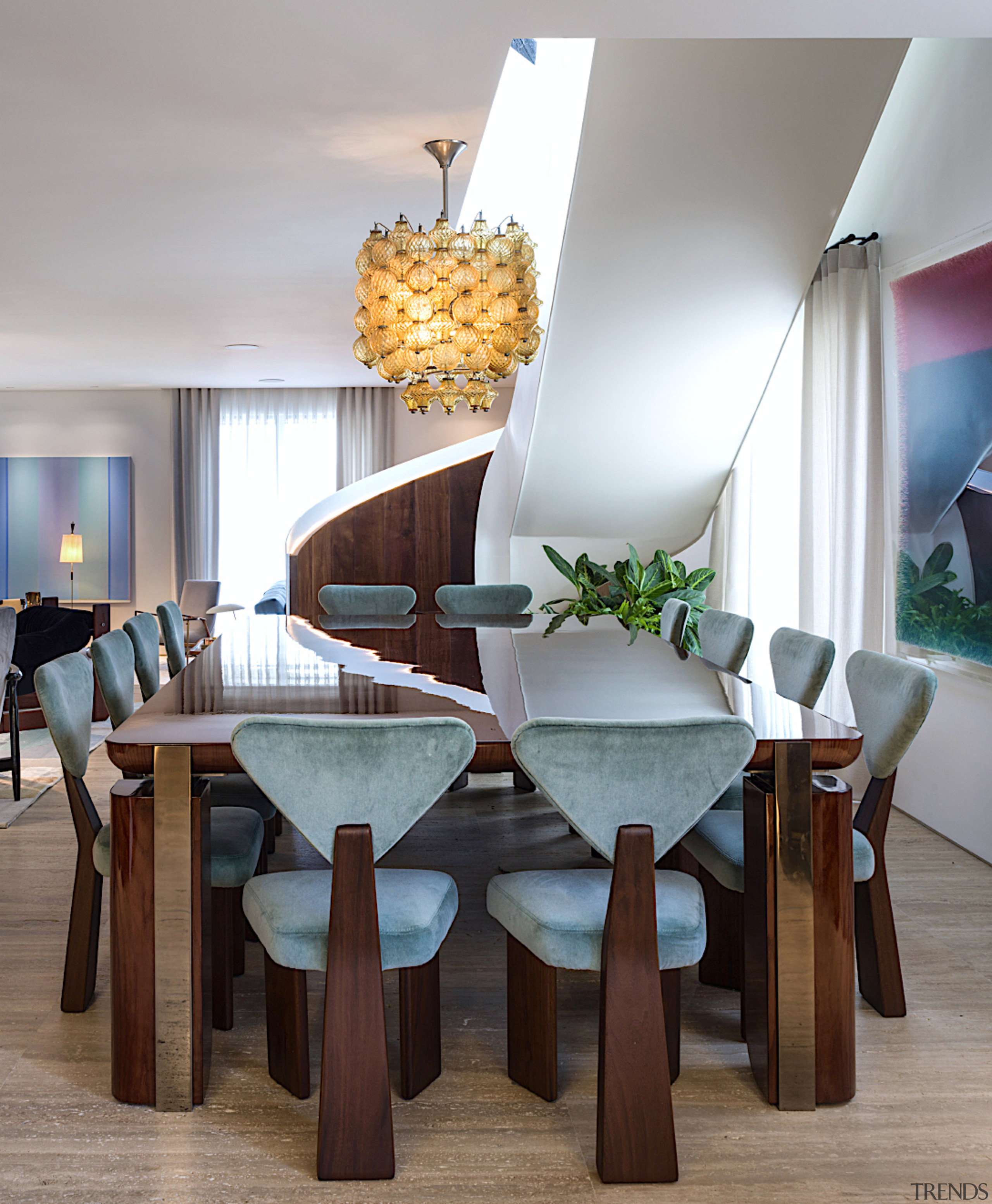 Dining table with artistic pendant above. - Personality 