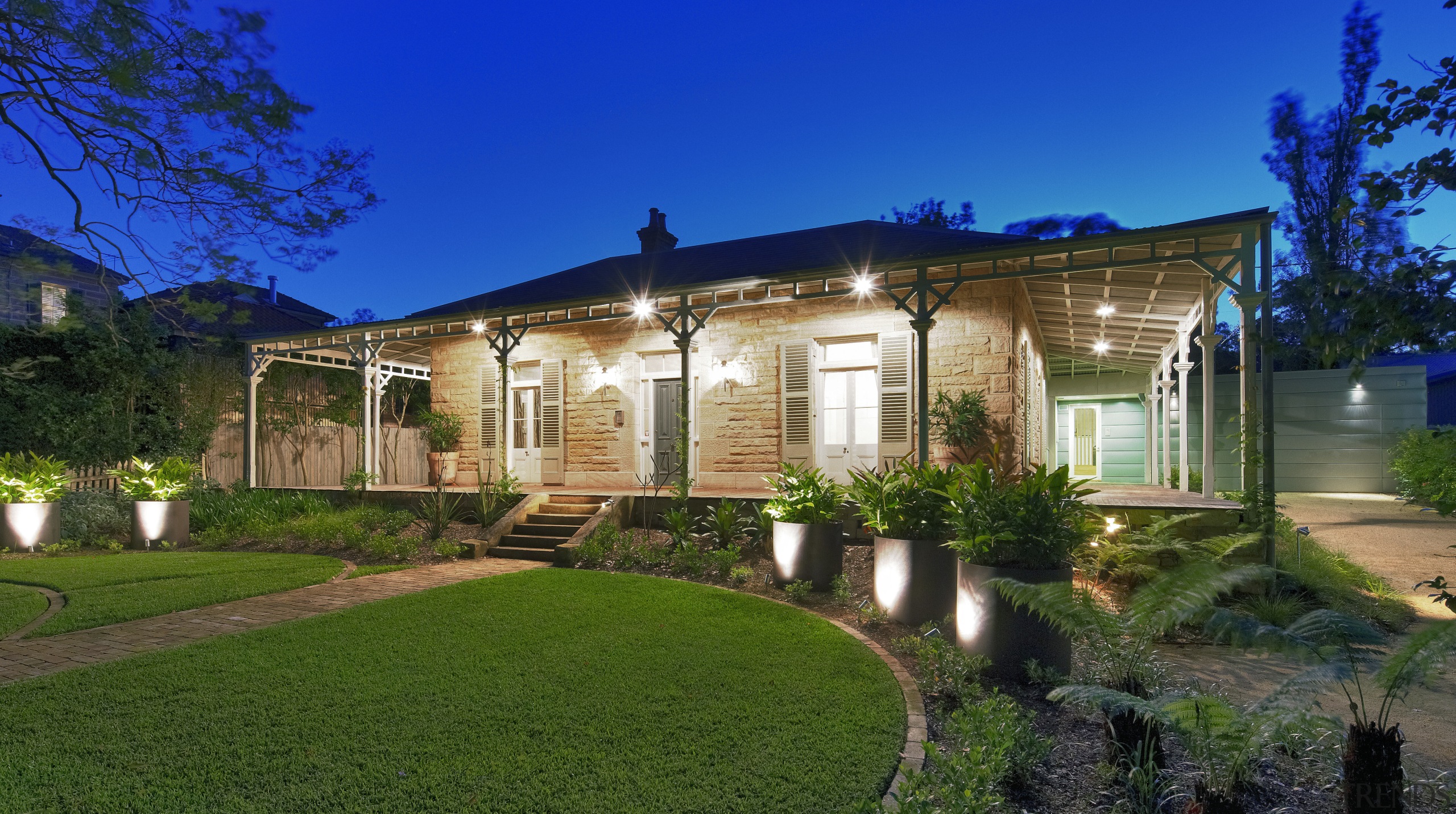 Exterior view of a renovated period home. - backyard, cottage, estate, facade, farmhouse, grass, home, house, landscape, landscaping, lighting, mansion, plant, property, real estate, residential area, sky, villa, yard, blue