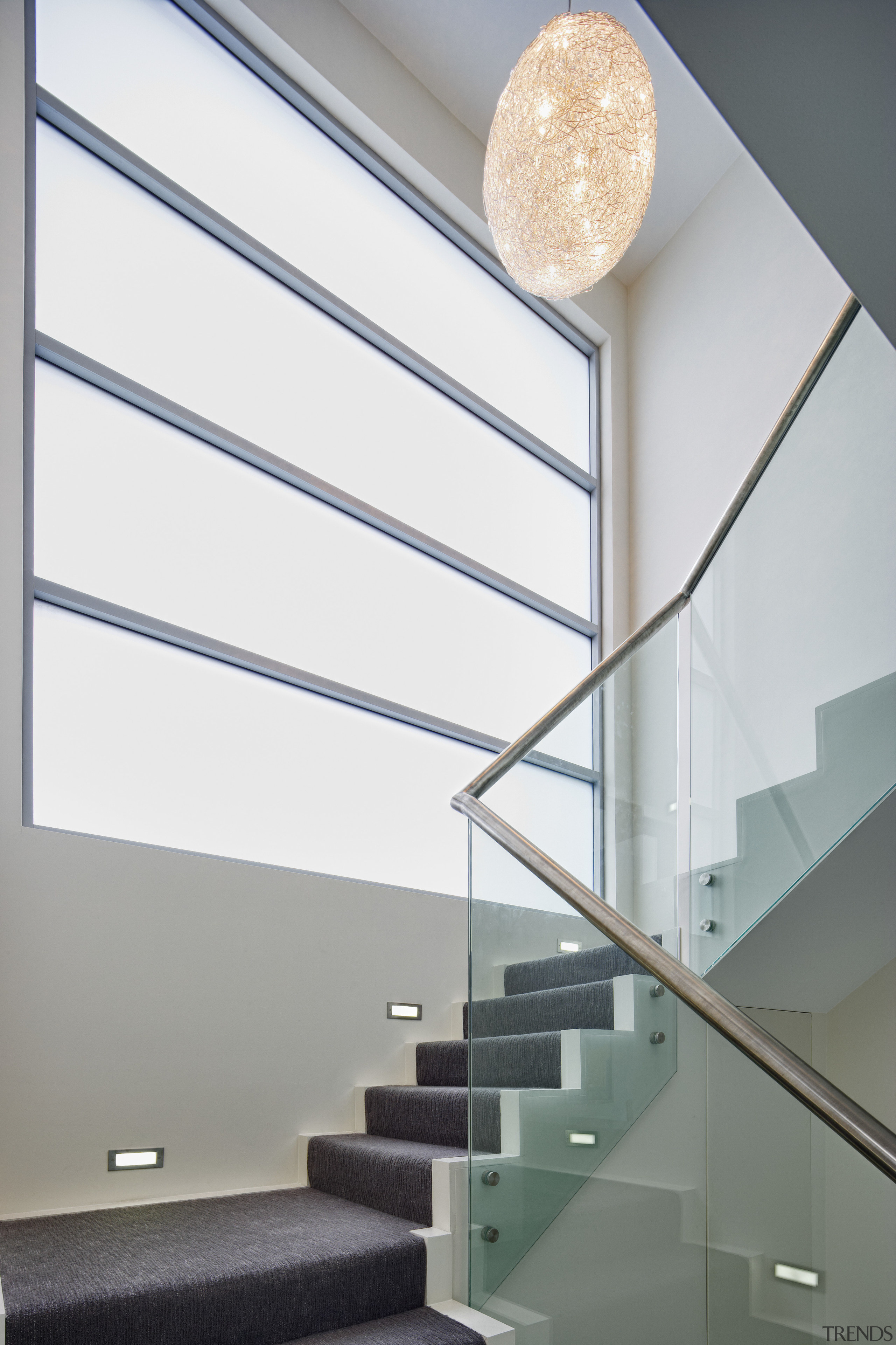 Large two story familyhome by Starr Constructions. Designed architecture, ceiling, daylighting, glass, handrail, home, house, interior design, product design, stairs, wall, gray, white