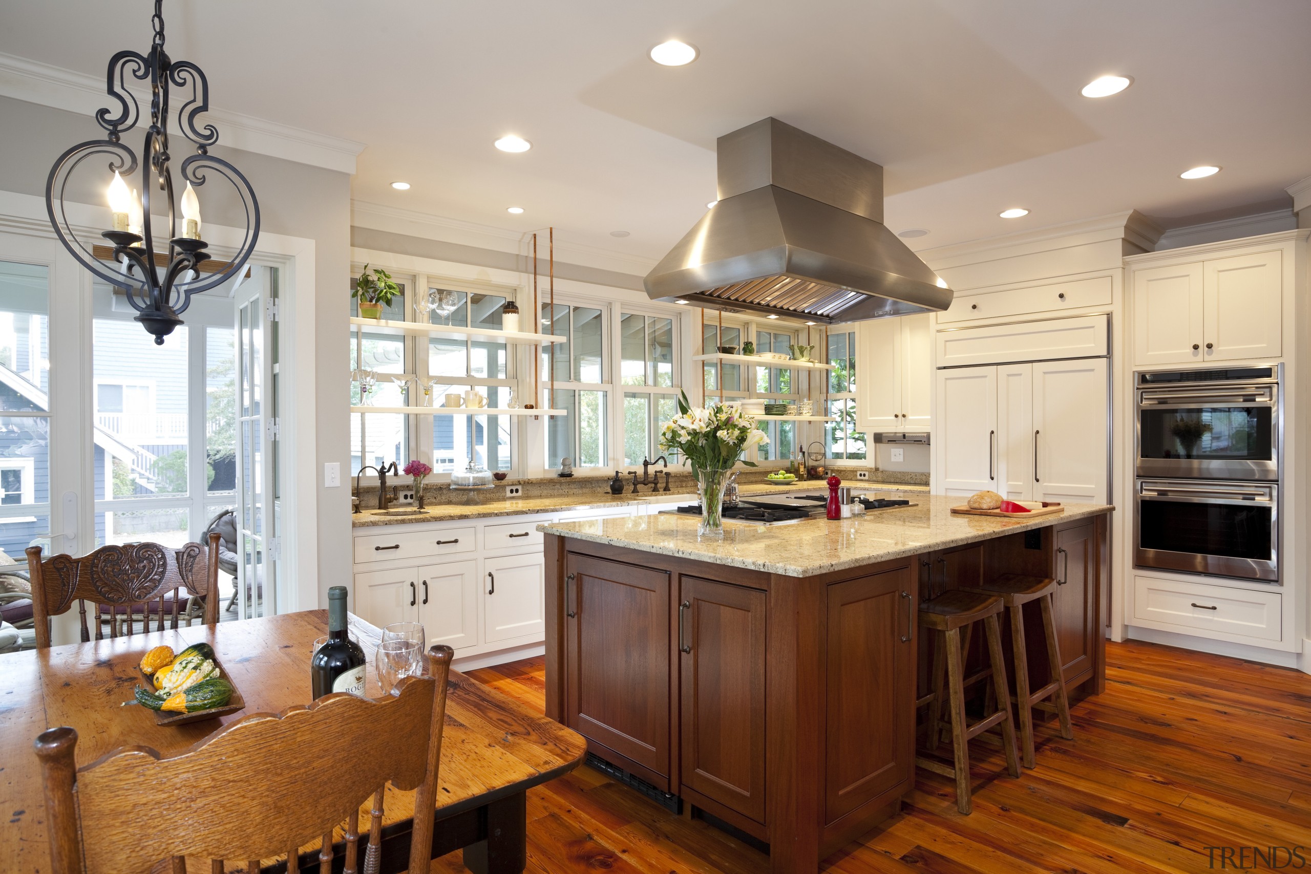 View of kitchen with wooden flooring and island, cabinetry, countertop, cuisine classique, home, interior design, kitchen, real estate, room, gray