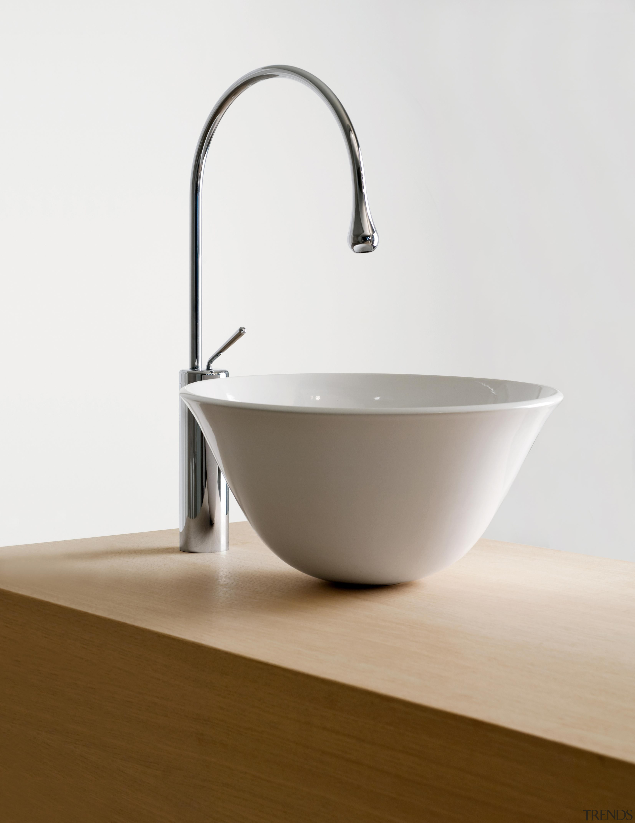 Classic chrome Goccia deck-mount faucet and elegant white bathroom sink, ceramic, plumbing fixture, product design, sink, tap, white