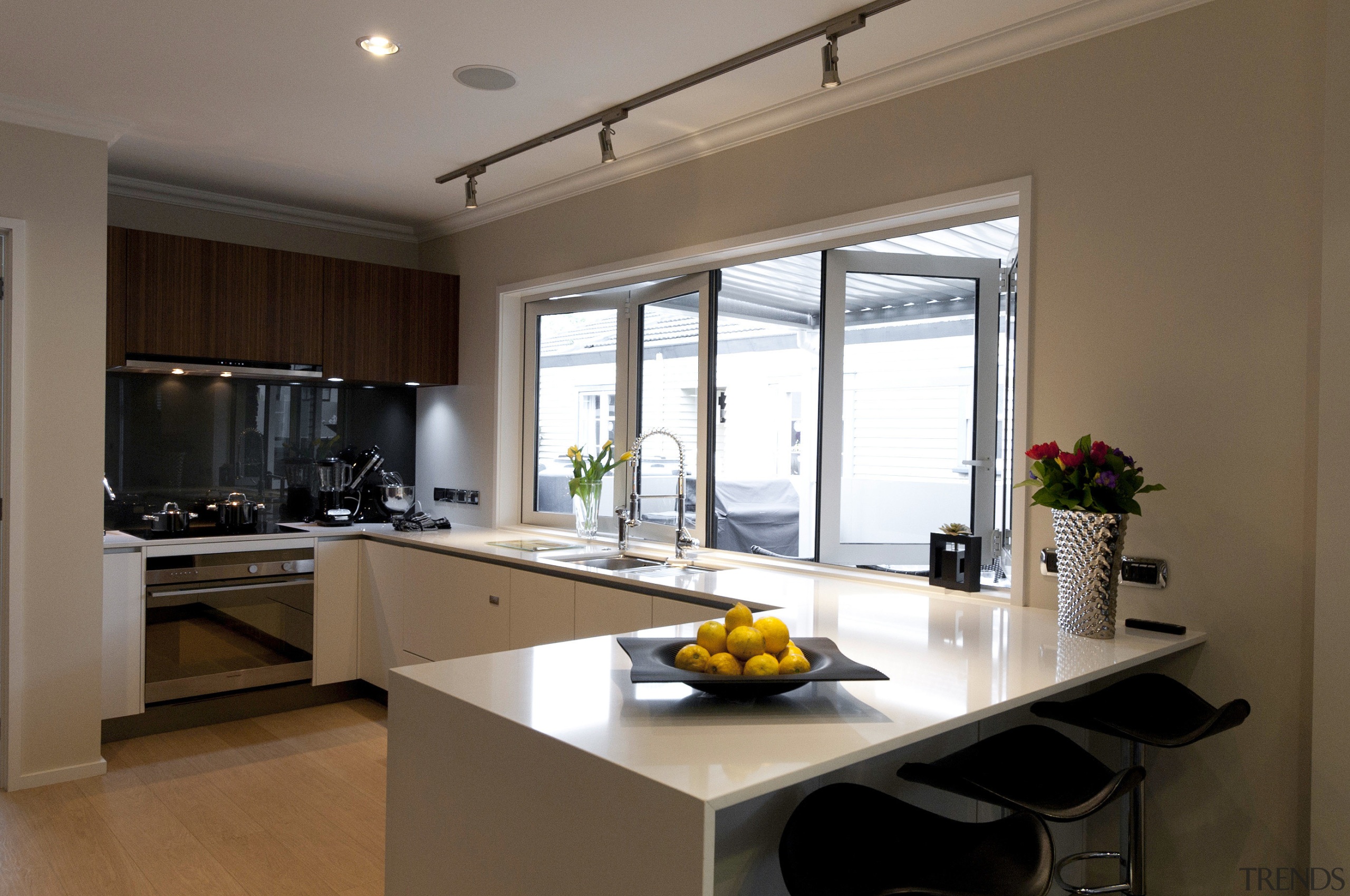 View of a renovated show home kitchen designed countertop, cuisine classique, interior design, kitchen, real estate, room, window, brown