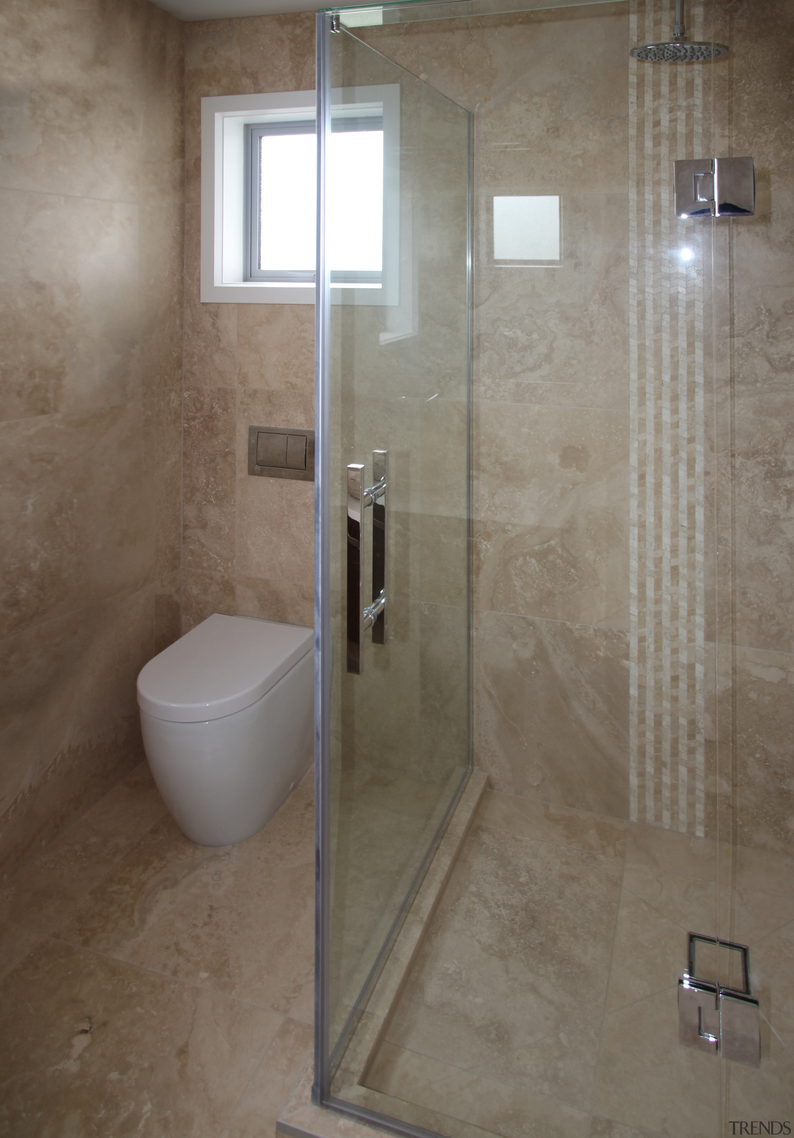 Top quality Italian travertine stone from Casa Italiana bathroom, floor, flooring, glass, plumbing fixture, room, shower, tile, wall, gray, brown