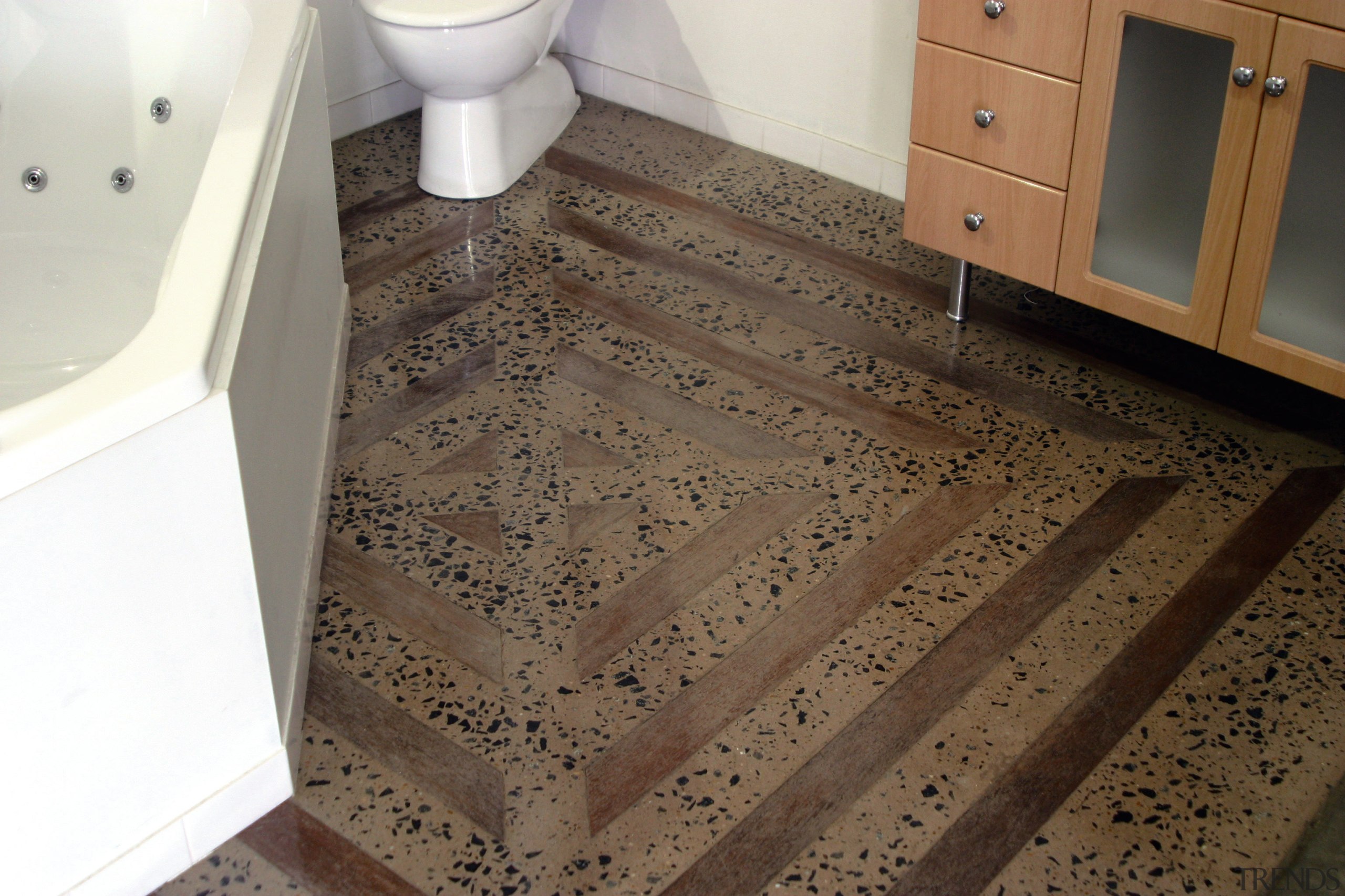 Bathroom with highly polished and patterned concrete floor, floor, flooring, hardwood, room, tile, wood, wood stain, brown