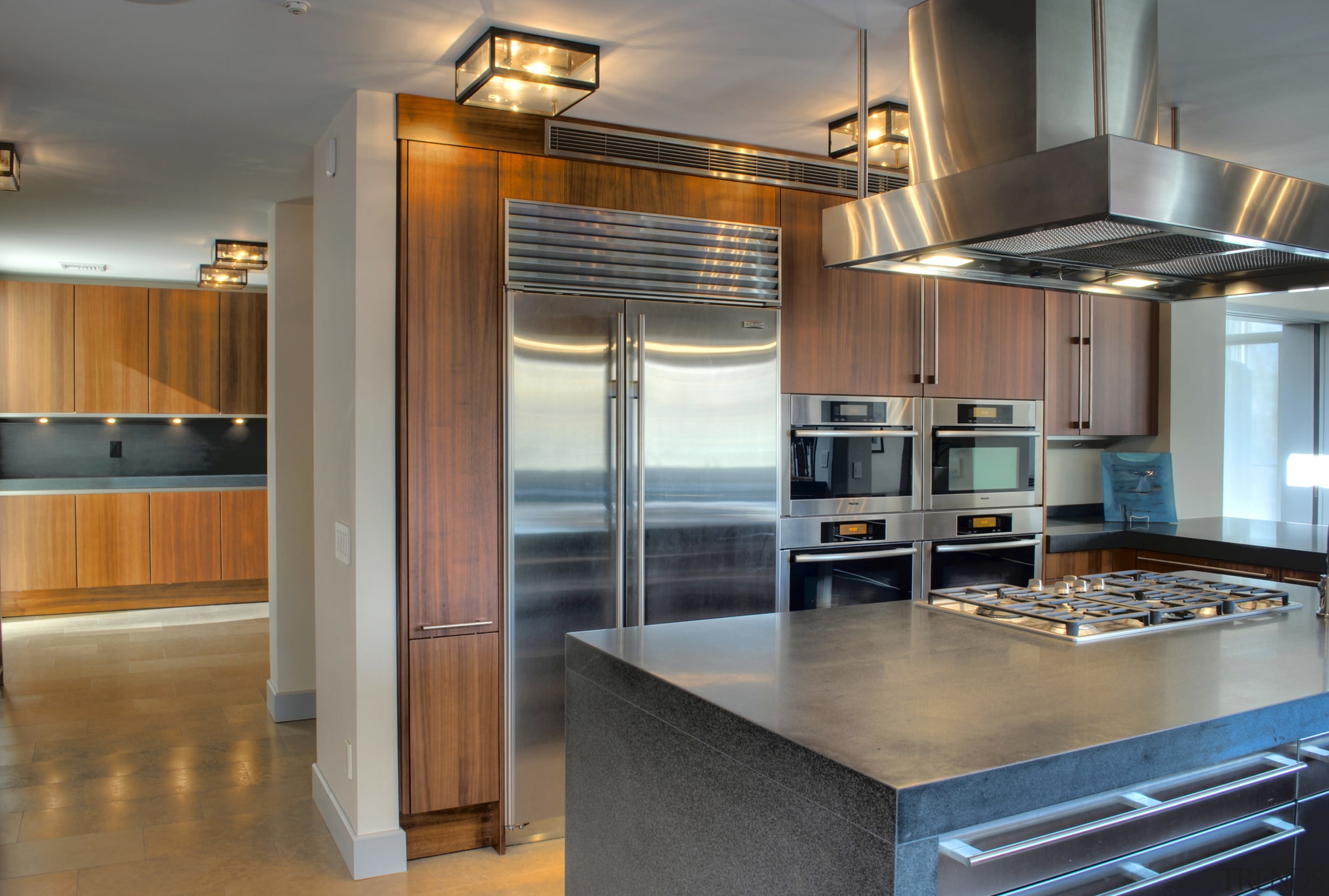 View of contemporary kitchen and dining area with cabinetry, countertop, cuisine classique, hardwood, interior design, kitchen, real estate, gray, brown